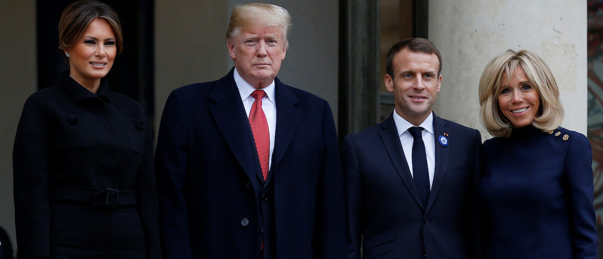 French President Emmanuel Macron and his wife Brigitte Macron accompany U.S. President Donald Trump and first lady Melania Trump after a meeting at the Elysee Palace on the eve of the commemoration ceremony for Armistice Day, 100 years after the end of the First World War, in Paris, France, November 10, 2018. REUTERS/Vincent Kessler
