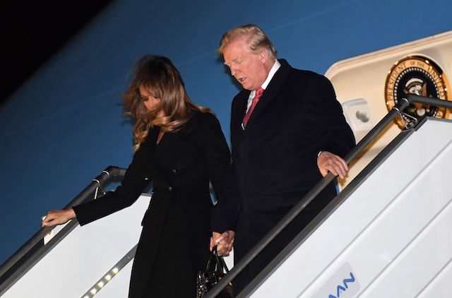 US President Donald Trump (R) and US First Lady Melania Trump arrive at Orly airport, outside Paris on November 9, 2018, ahead of commemorations marking the 100th anniversary of the 11 November 1918 armistice, ending World War I. (Photo credit: SAUL LOEB/AFP/Getty Images)
