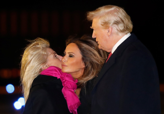U.S. President Donald Trump and first lady Melania Trump greet U.S. Ambassador to the French Republic and Principality of Monaco Jamie D. McCourt as they arrive at Orly Airport near Paris to attend commemoration ceremonies for Armistice Day, 100 years after the end of the First World War, France, November 9, 2018. REUTERS/Carlos Barria 