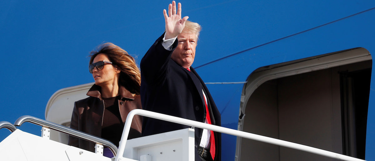 U.S. President Donald Trump and first lady Melania Trump board Air Force One to depart for Argentina ands the G20 Summit from Joint Base Andrews in Maryland, U.S., November 29, 2018. REUTERS/Kevin Lamarque