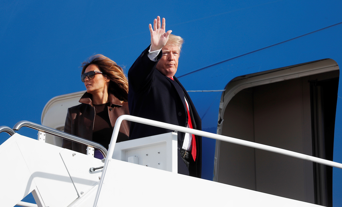 U.S. President Donald Trump and first lady Melania Trump board Air Force One to depart for Argentina ands the G20 Summit from Joint Base Andrews in Maryland, U.S., November 29, 2018. REUTERS/Kevin Lamarque