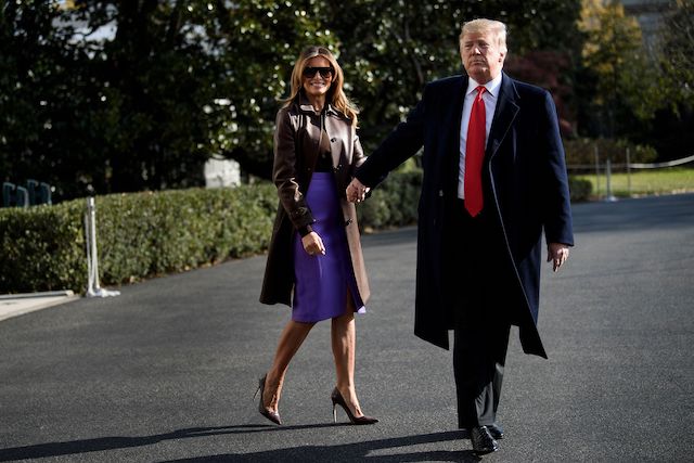 US First Lady Melania Trump and US President Donald Trump walk to Marine One on the South Lawn of the White House November 29, 2018 in Washington, DC. - Trump said Thursday a weekend G20 summit of world leaders would be a "very good time" for a meeting with Russian leader Vladimir Putin. (Photo credit: BRENDAN SMIALOWSKI/AFP/Getty Images)