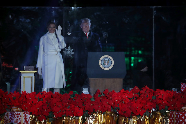 U.S. President Donald Trump and first lady Melania Trump attend the National Christmas Tree lighting ceremony held by the National Park Service at the Ellipse near the White House on November 28, 2018 in Washington, DC. This is the 96th annual National Christmas Tree Lighting Ceremony. (Photo by Mark Wilson/Getty Images)