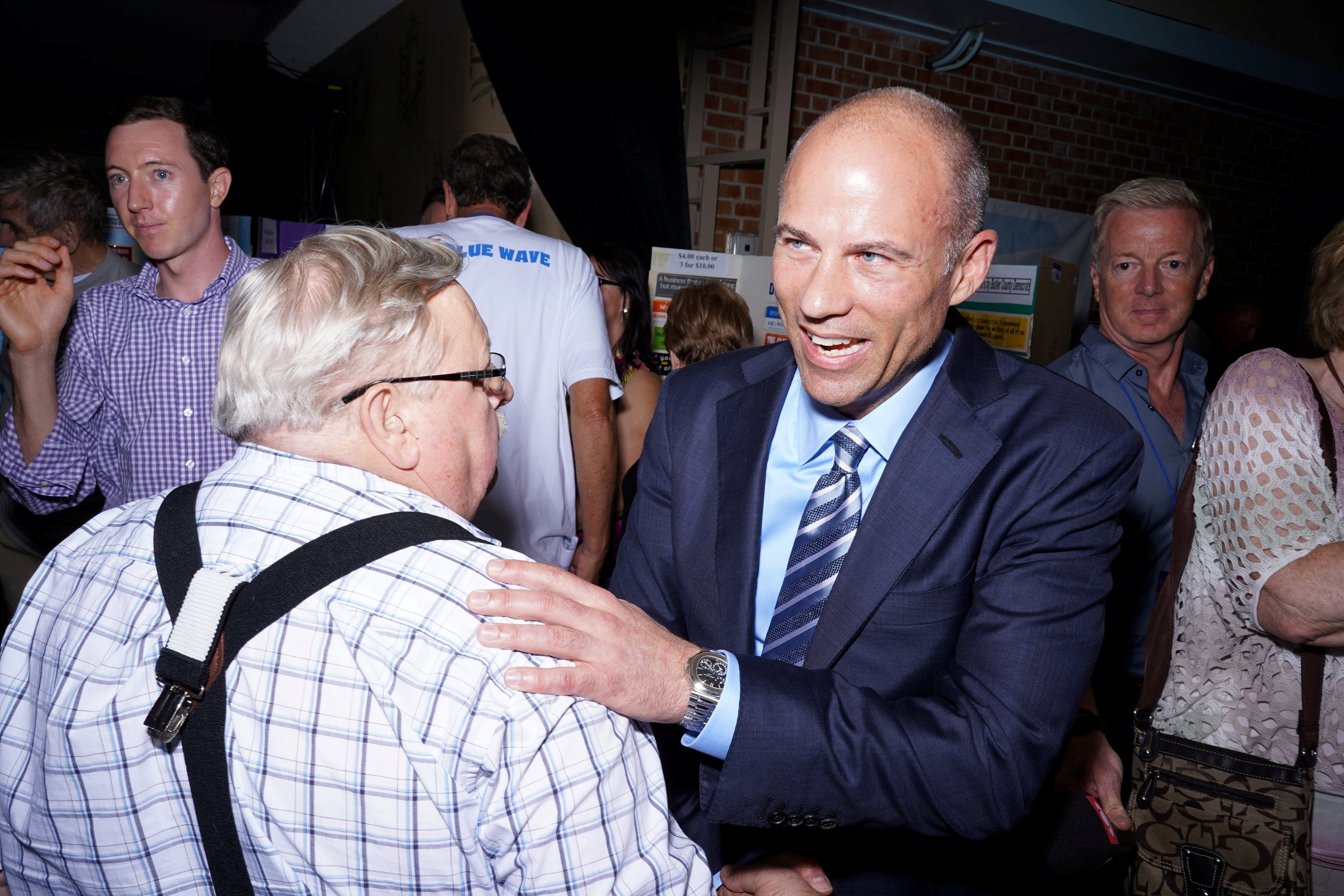 Michael Avenatti talks with supporters after speaking at the Iowa Democratic Wing Ding in Clear Lake, Iowa, U.S., August 10, 2018. Picture taken August 10, 2018. REUTERS/KC McGinnis - RC16EB375840