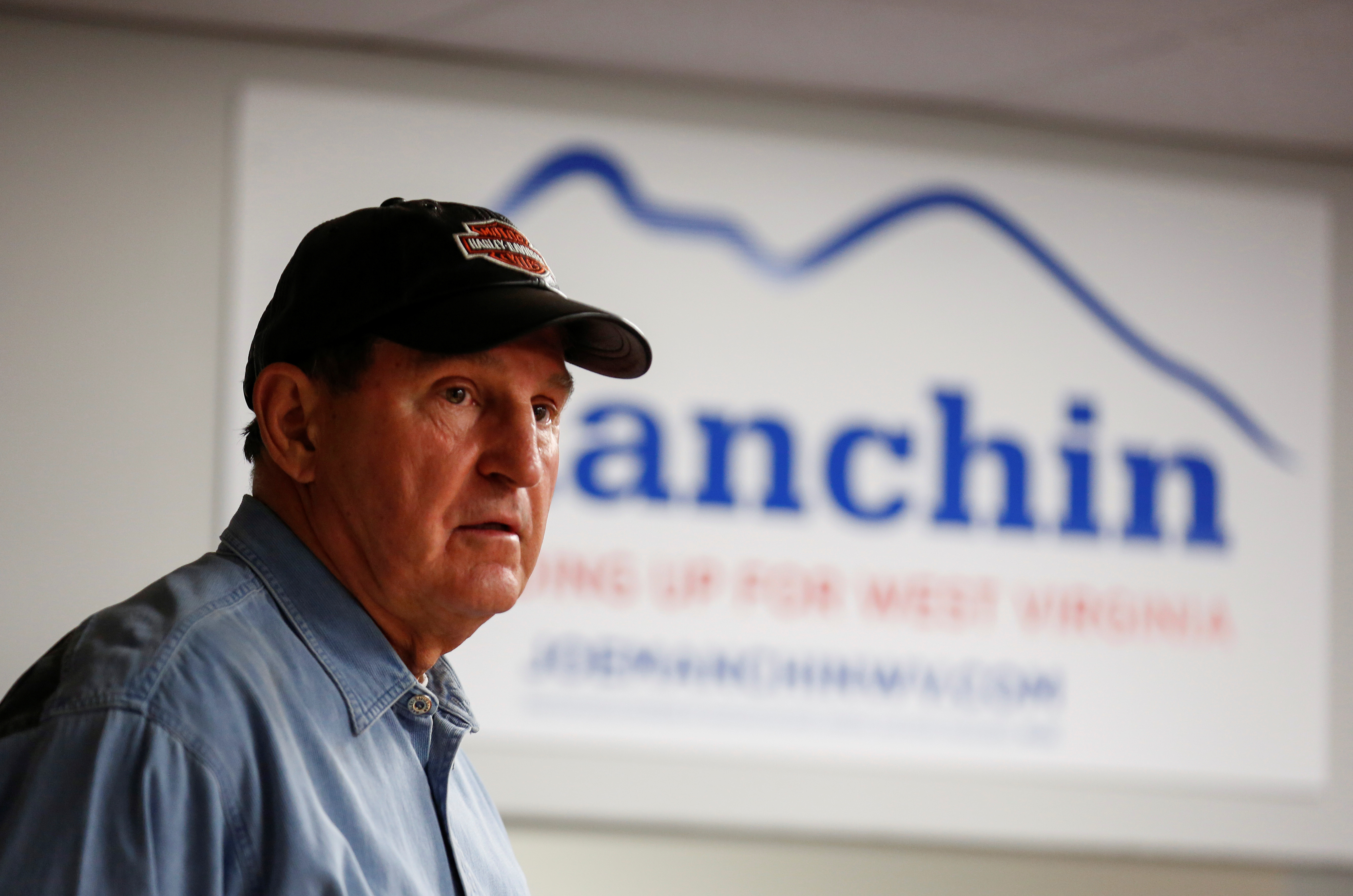 Senator Joe Manchin (D-WV) speaks to supporters after campaigning for the 2018 midterm elections at his headquarters in Charlestown, West Virginia, U.S., November 5, 2018. REUTERS/Joshua Roberts - RC159A652940