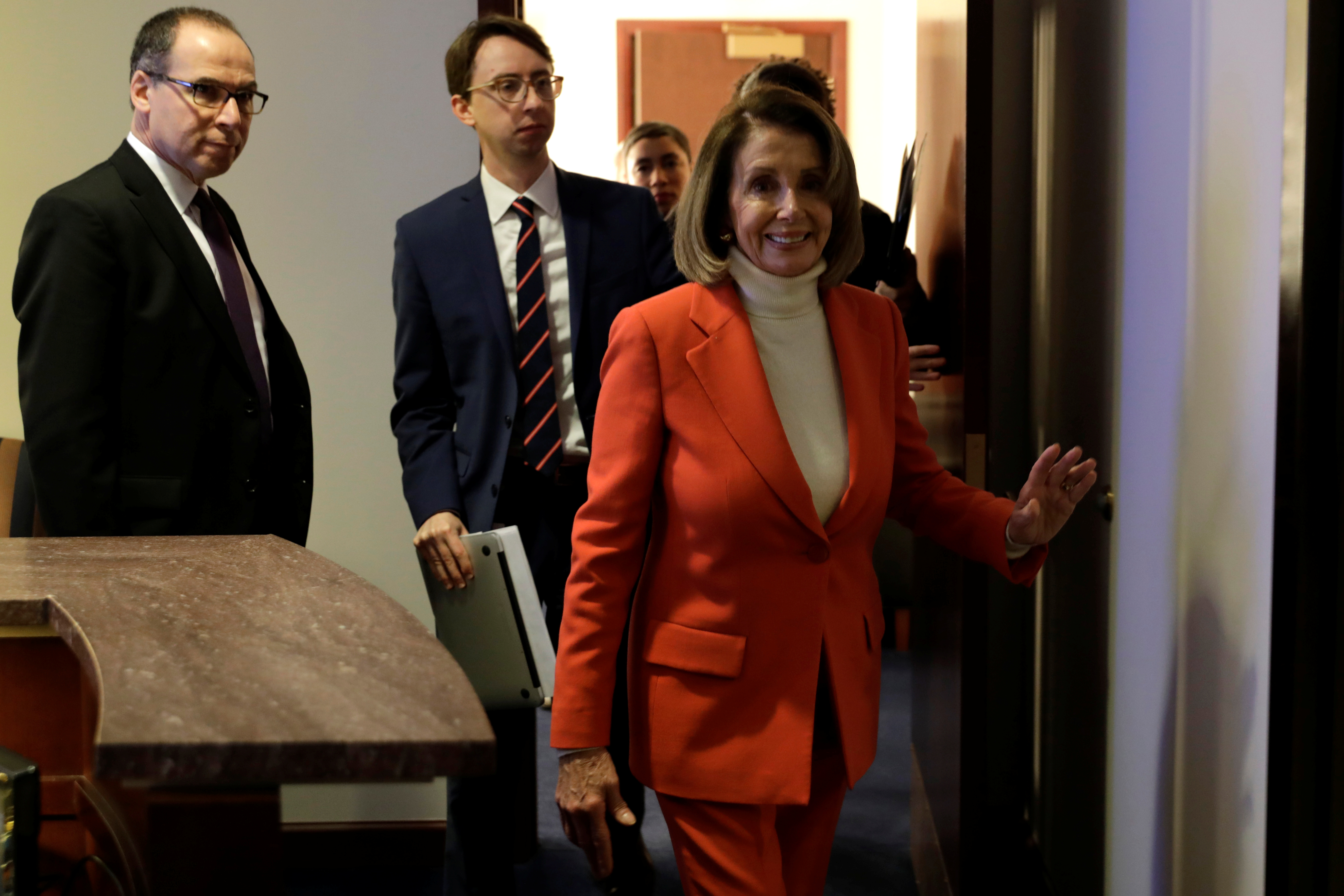 House Minority Leader Nancy Pelosi leaves after her weekly news conference on Capitol Hill in Washington