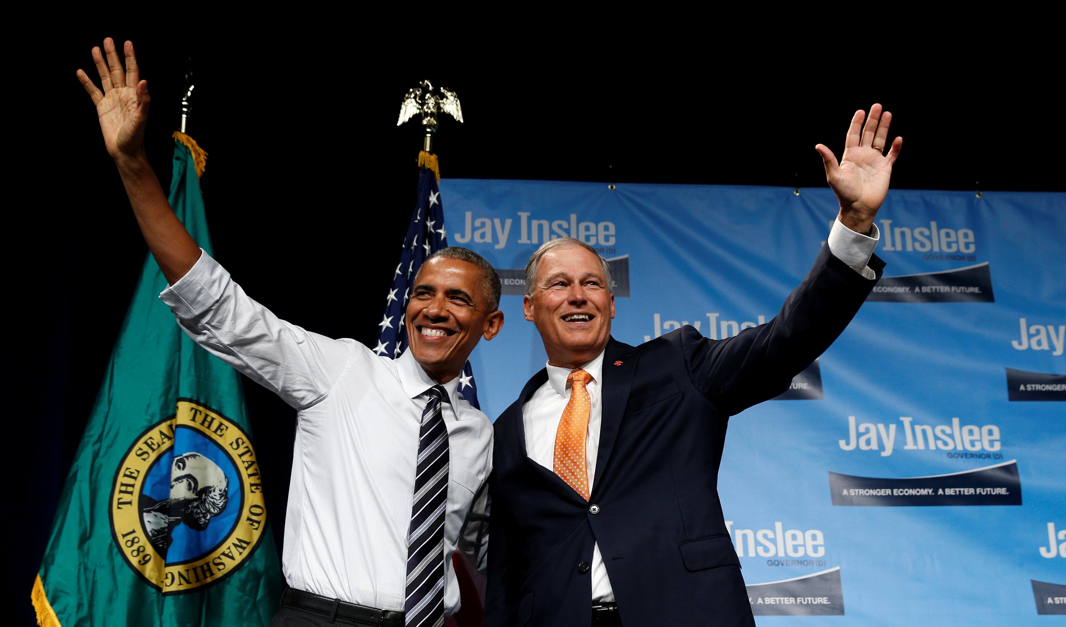 U.S. President Barack Obama waves as he arrives to speak at a fundraiser for Washington Governor Jay Inslee in Seattle