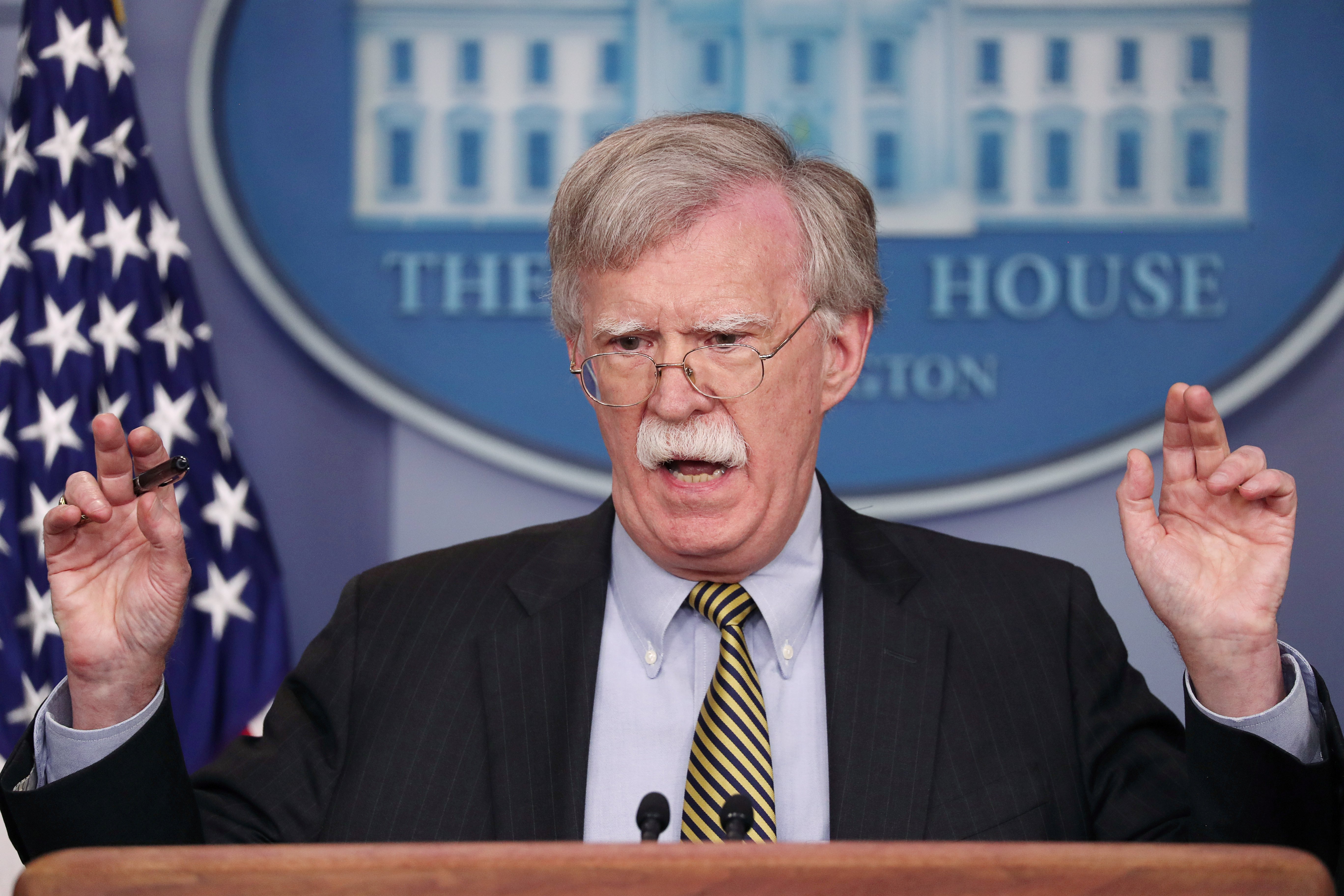 FILE PHOTO: U.S. National Security Adviser John Bolton answers a question from a reporter about how he refers to Palestine during a news conference in the White House briefing room in Washington, U.S., October 3, 2018. REUTERS/Jonathan Ernst/File Photo - RC18BF8B9EC0