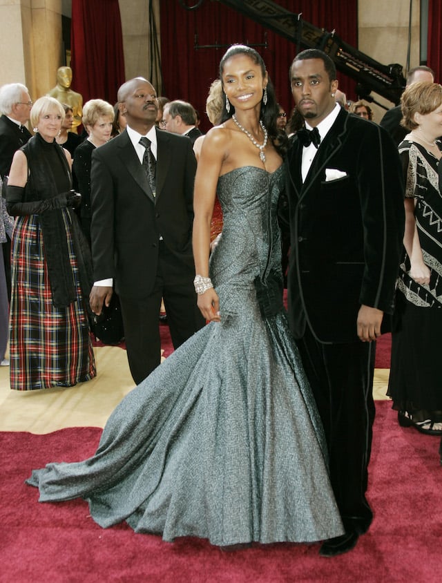 Entertainer Sean "P. Diddy" Combs (R) and girlfriend Kim Porter arrive at the 77th annual Academy Awards in Hollywood, February 27, 2005. Combs is a presenter for the awards show. REUTERS/John Schults