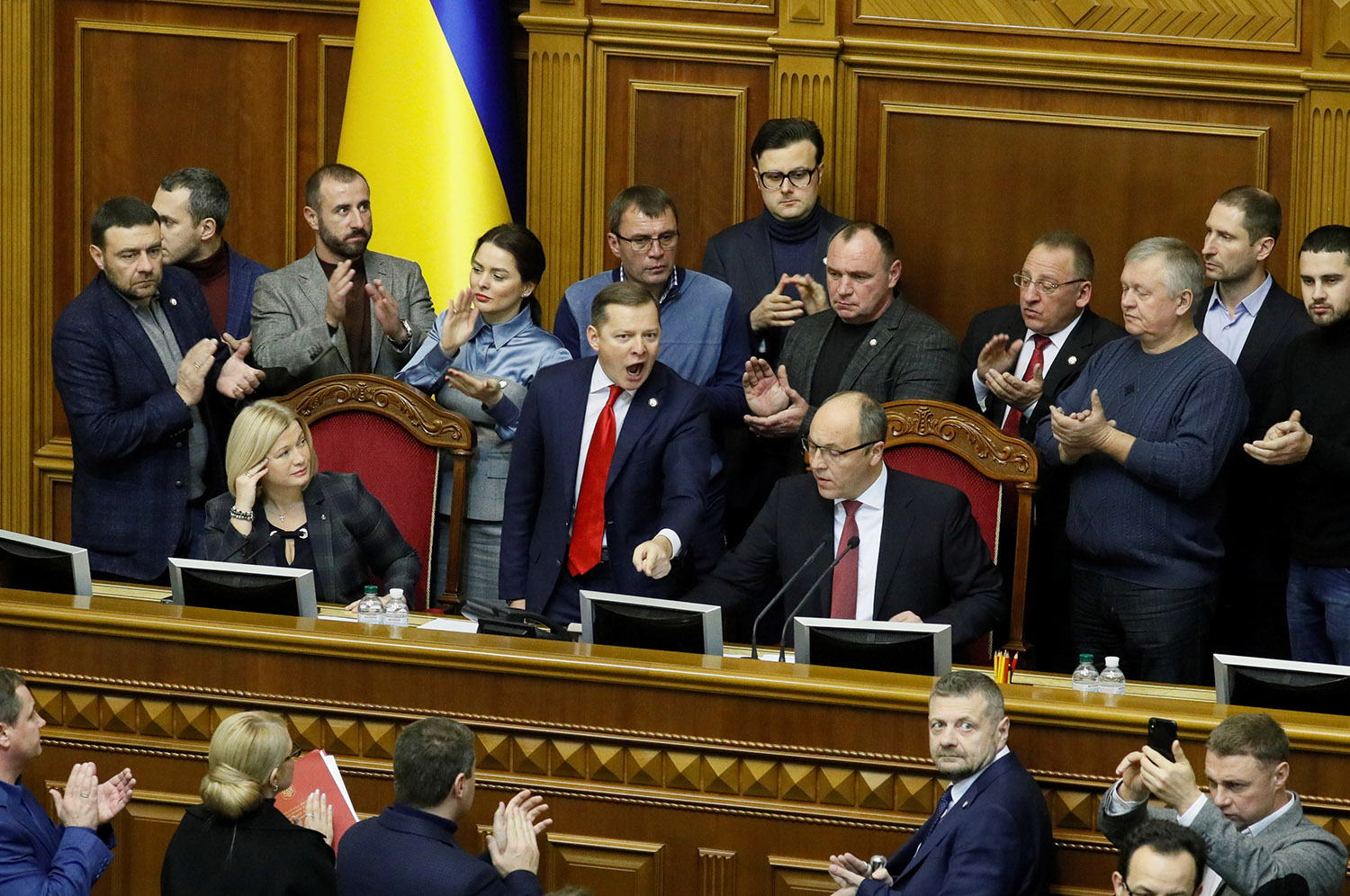 Radical party leader Oleh Lyashko (C) attends a parliament session to review a proposal by Ukrainian President Petro Poroshenko to introduce martial law for 60 days after Russia seized Ukrainian naval ships off the coast of Russia-annexed Crimea, in Kiev, Ukraine November 26, 2018. REUTERS/Valentyn Ogirenko