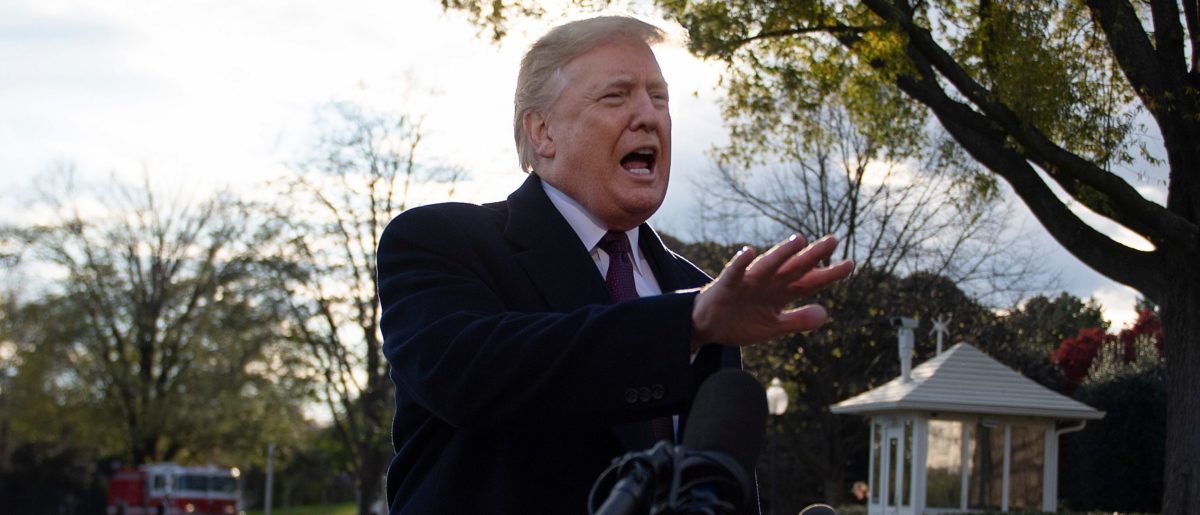 US President Donald Trump speaks as he departs the White House in Washington, DC, on November 20, 2018. - Trump is traveling to Mar-a-Lago in Palm Beach, Florida, for the Thanksgiving Holiday (JIM WATSON/AFP/Getty Images)