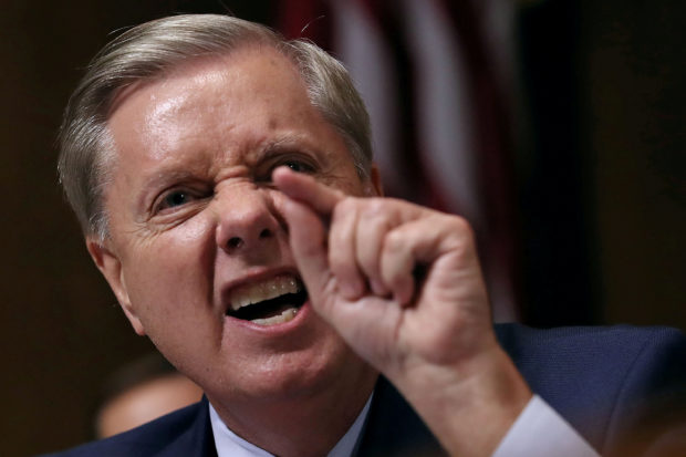 Senate Judiciary Committee member Sen. Lindsey Graham (R-SC) shouts while questioning Judge Brett Kavanaugh during his Supreme Court confirmation hearing in the Dirksen Senate Office Building on Capitol Hill in Washington, U.S., September 27, 2018. Win McNamee/Pool via REUTERS