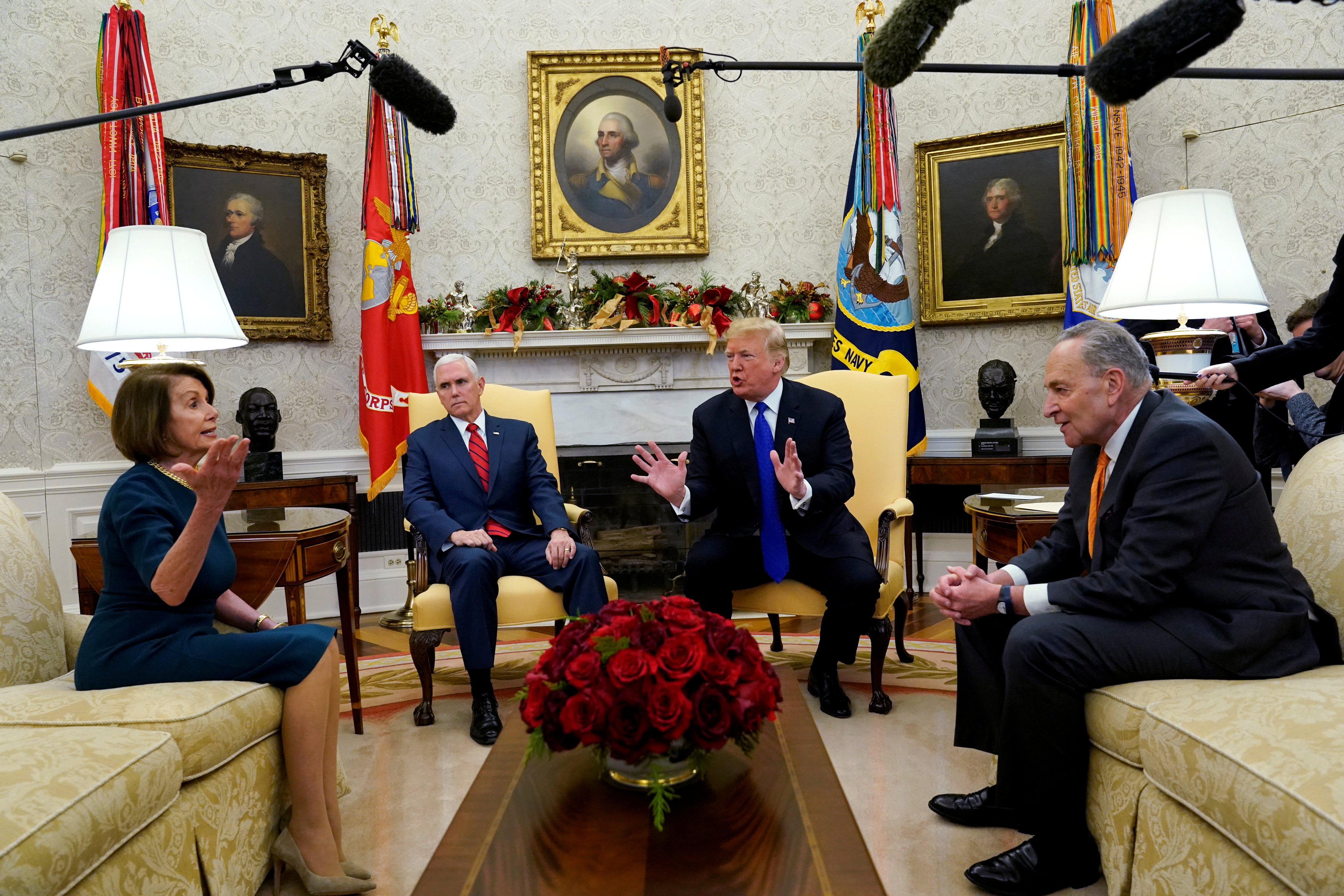 President Donald Trump speaks next to VP Mike Pence while meeting with Senate Democratic Leader Chuck Schumer and House Democratic Leader Nancy Pelosi at the White House REUTERS/Kevin Lamarque