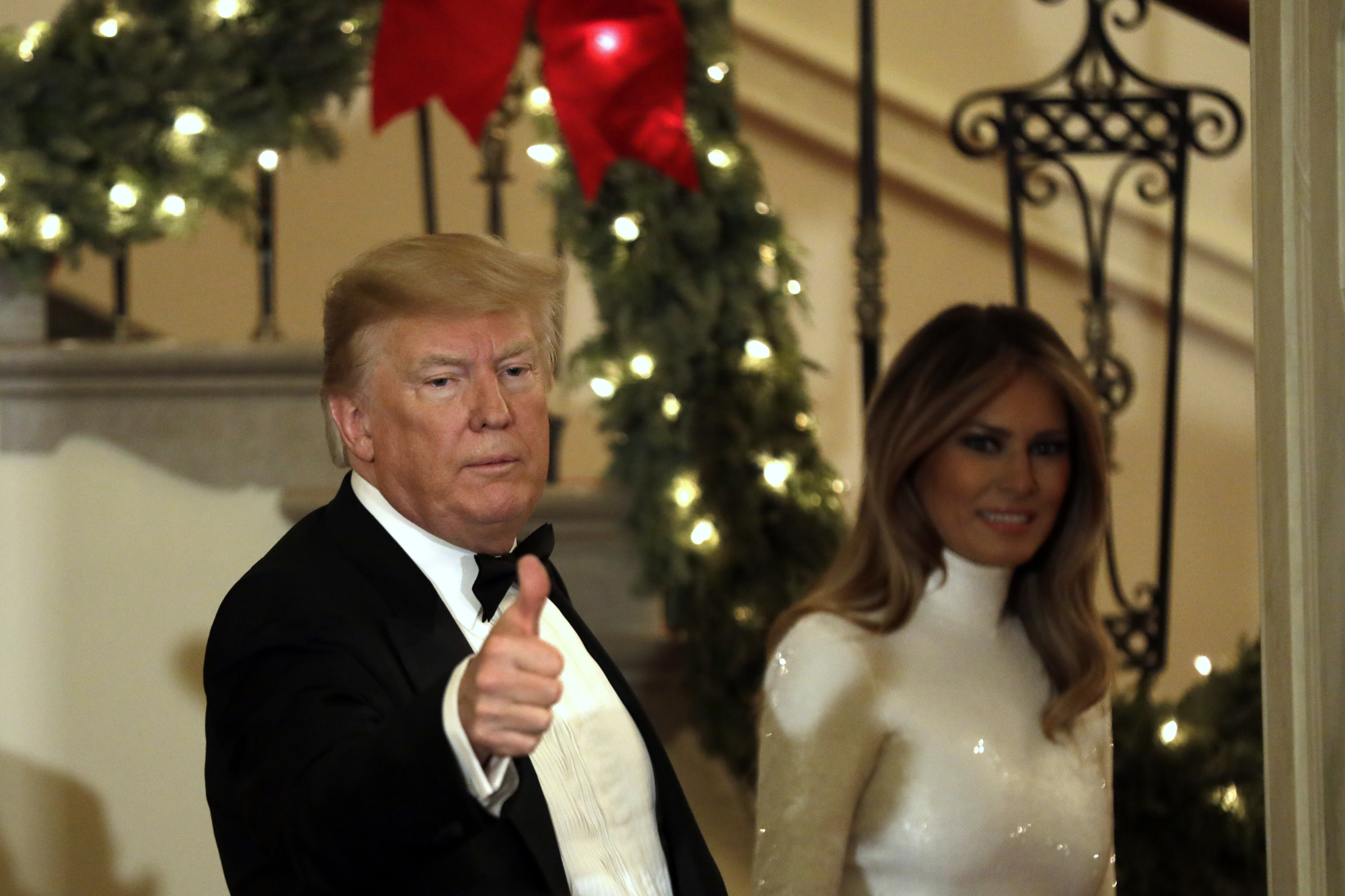 President Donald Trump and First Lady Melania Trump greet guests at the Congressional Ball at White House in Washington on December 15, 2018. (Yuri Gripas-Pool/Getty Images)