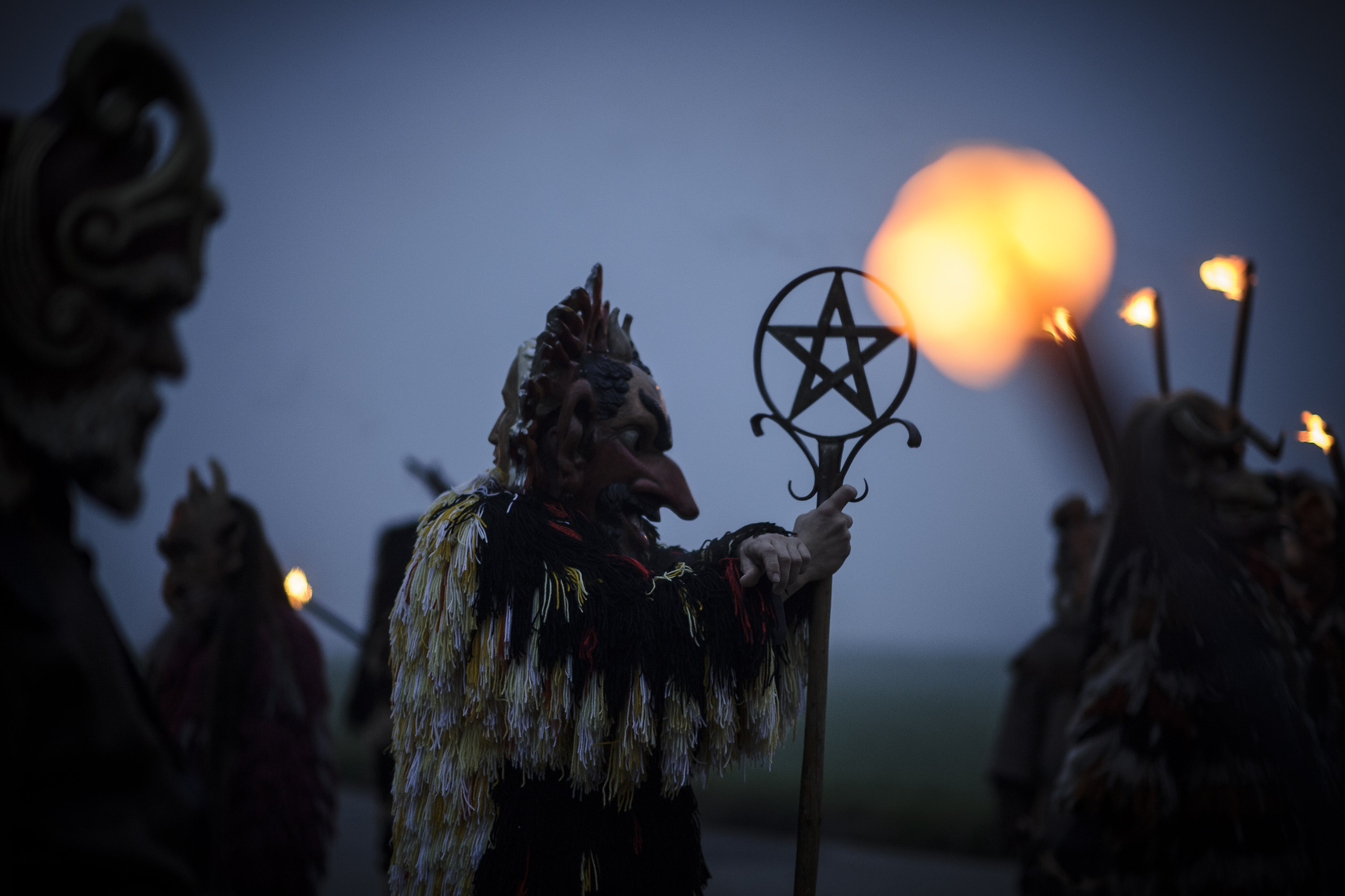 Participants dressed as Perchten roam village streets to chase away evil winter spirits in the annual Perchten gathering in Bavaria on November 29, 2014 near Kirchseeon, Germany. Perchten are the mythical entourage of Perchta, a goddess in ancient southern German alpine pagan tradition, and are usually fearsome creatures with tusks and horns and covered in hair. The tradition dates back at least to the 16th century and is also related to traditions of Krampus, Teifel, Klausen and La Befana, all animal-like creatures in the German, Austrian, Italian and Swiss alpine regions whose duties include instilling fear into naughty children. (Photo by Philipp Guelland/Getty Images)