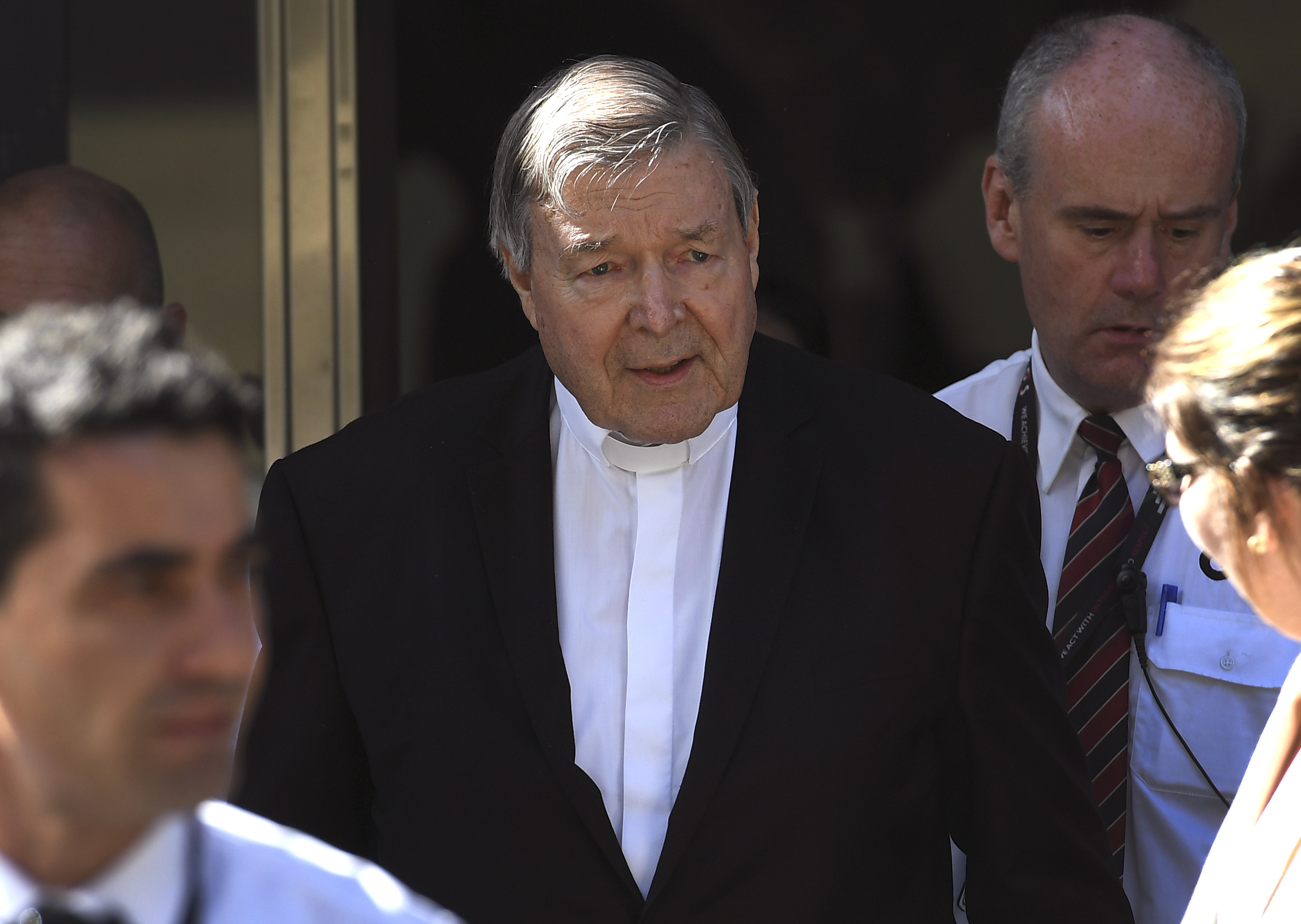 Cardinal George Pell walks to a car in Melbourne on December 11, 2018. - Pell is facing prosecution for historical child sexual offences. (WILLIAM WEST/AFP/Getty Images)