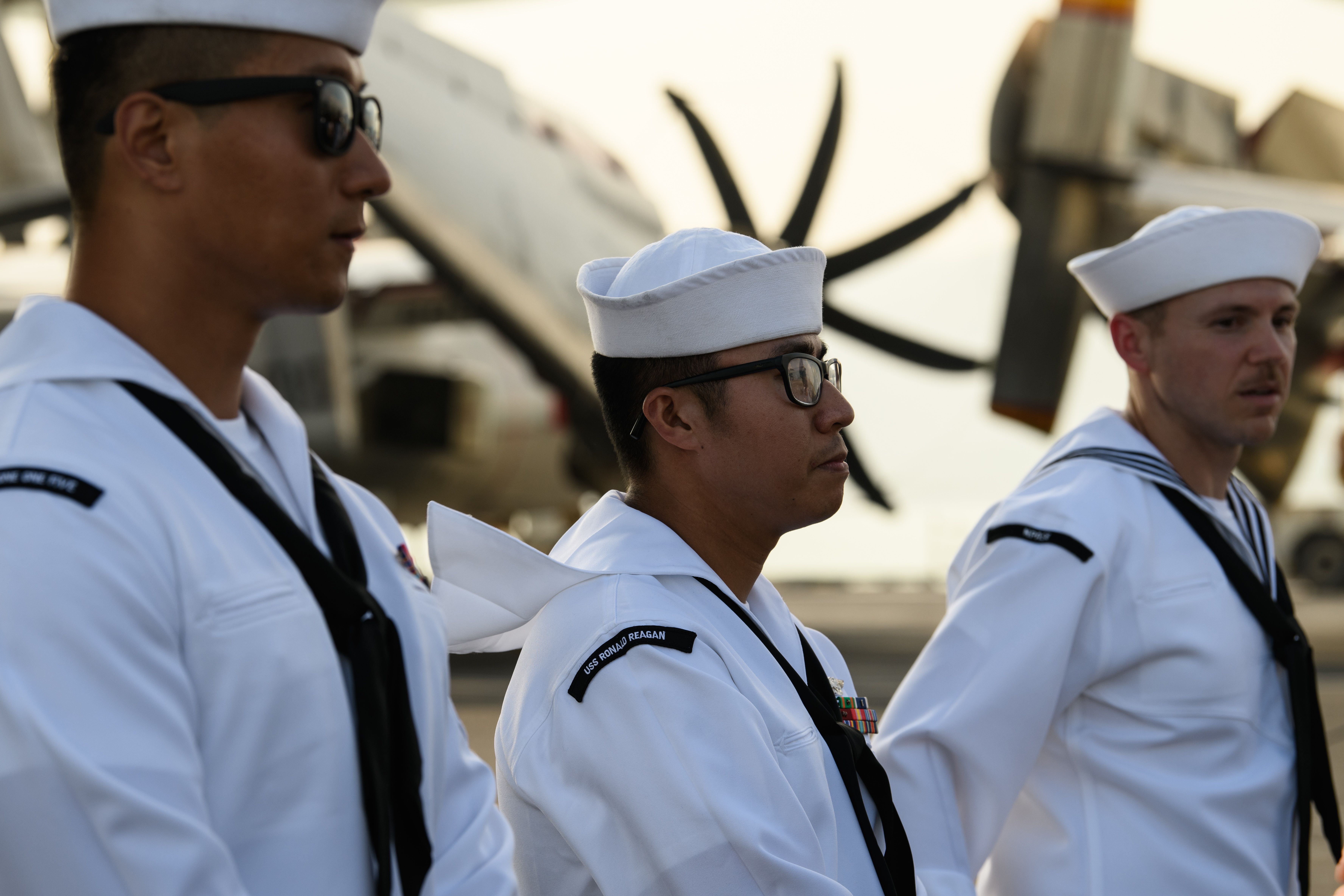 Sailors on board the US Navy's USS Ronald Reagan (CVN-76) aircraft carrier are seen on the flight deck during a port visit in Hong Kong on November 21, 2018. (ANTHONY WALLACE/AFP/Getty Images)