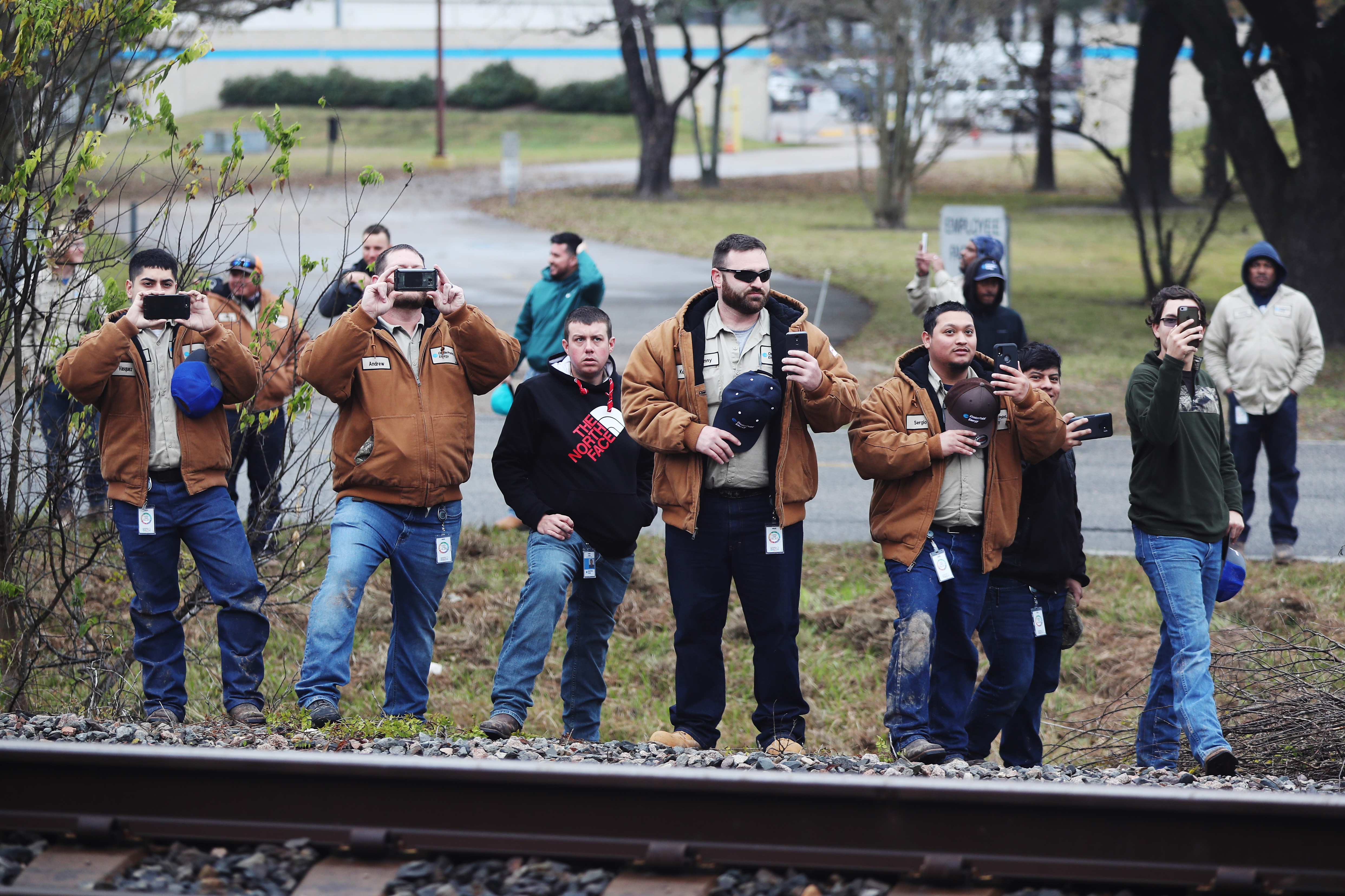 Members of the public line the route to pay their respects as the train carrying former President George H.W. Bush to his final resting place passes by on December 6, 2018 in Texas. (Photo by Joe Raedle/Getty Images)