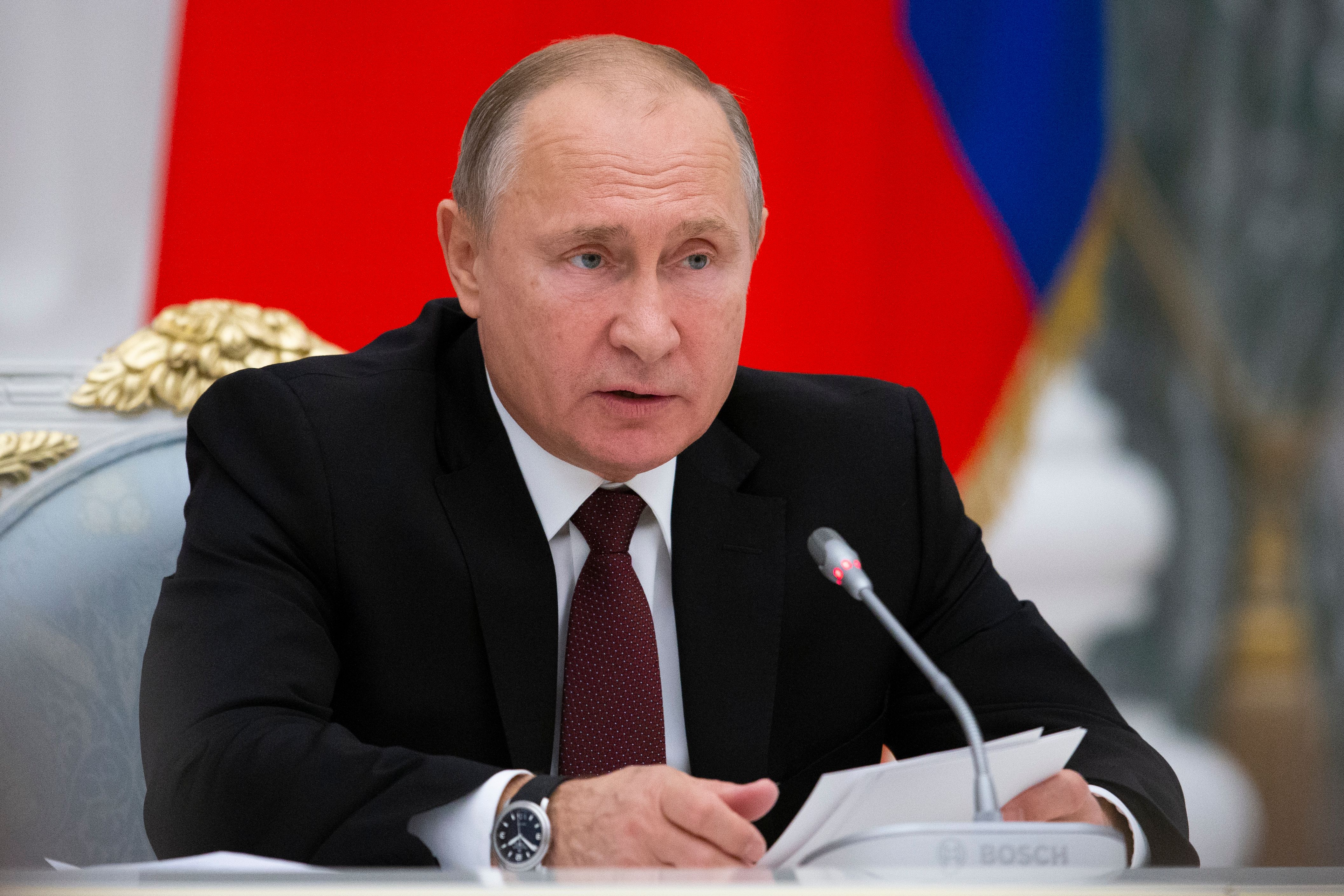 Russian President Vladimir Putin speaks a meeting to discuss preparation to mark the anniversary of the allied victory in the World War II in the Kremlin in Moscow on December 12, 2012. (ALEXANDER ZEMLIANICHENKO/AFP/Getty Images)