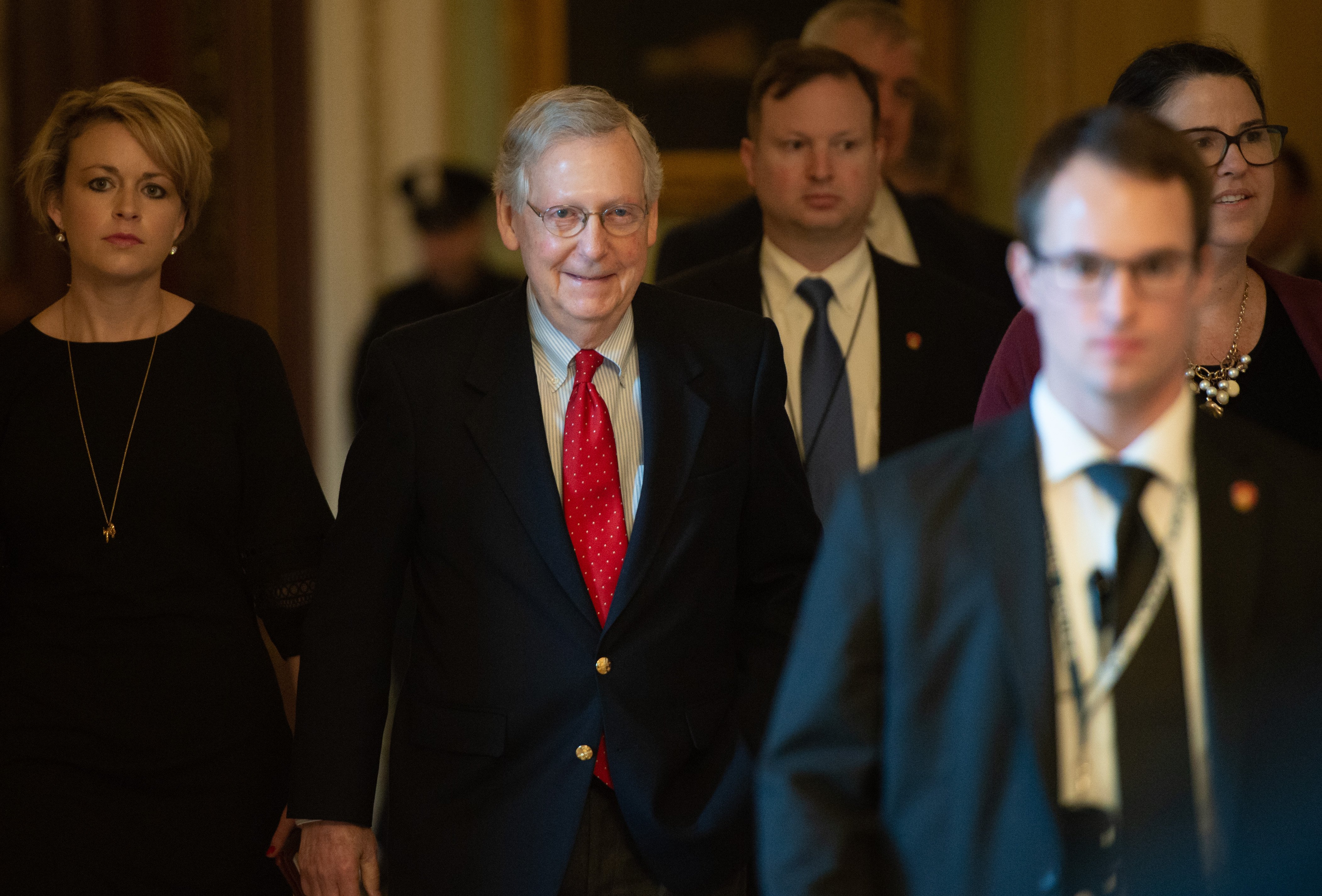 US Senate Majority Leader Mitch McConnell, Republican of Kentucky, walks to his office at the US Capitol in Washington, DC, December 21, 2018. - A US government shutdown appeared more and more likely to become a reality just before Christmas, with President Donald Trump threatening a "very long" federal work stoppage unless Democrats agree to his border wall demands. (Photo by SAUL LOEB/AFP/Getty Images)