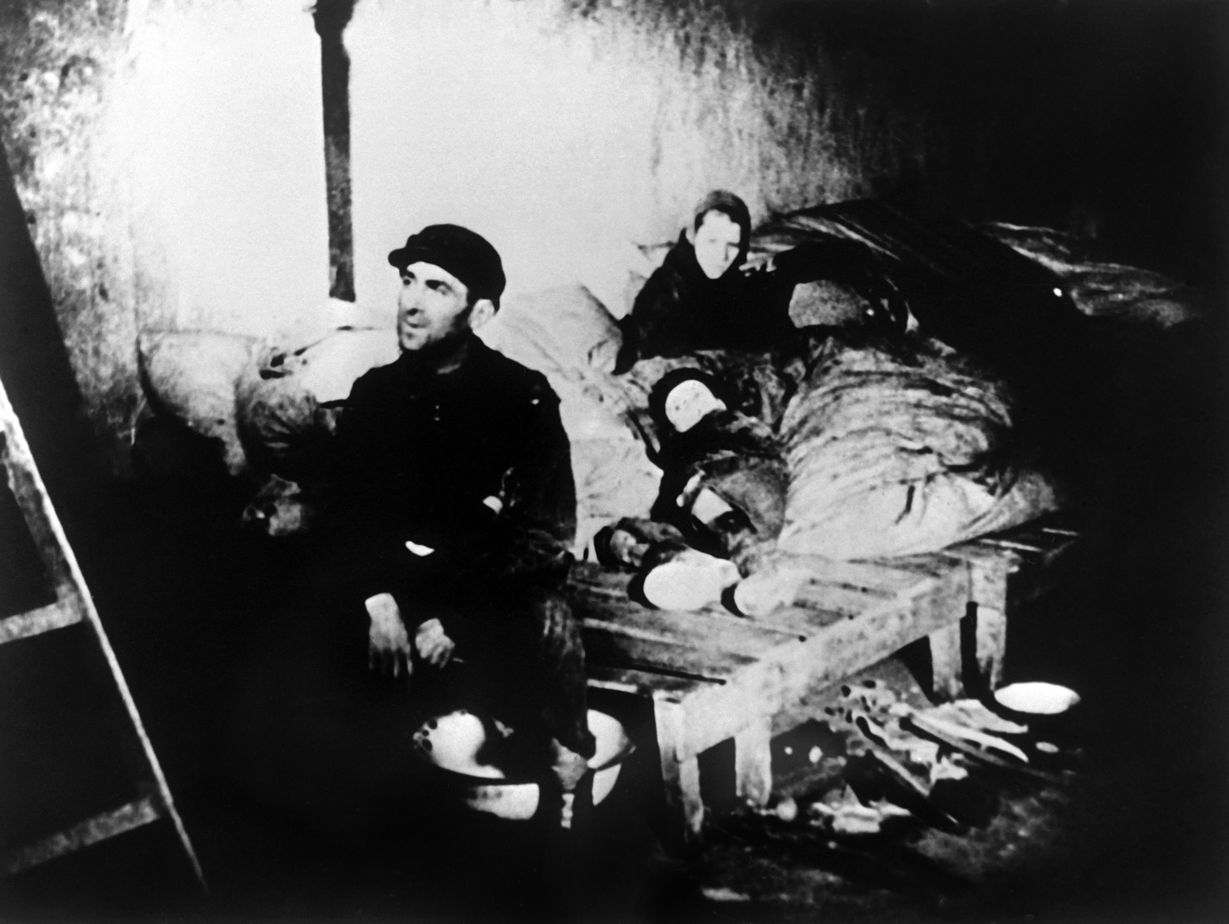 A CAF (Comite anti-fasciste) file picture dated 1943 shows a family in a house in the Warsaw Jewish ghetto during World War II. (Photo credit /AFP/Getty Images)