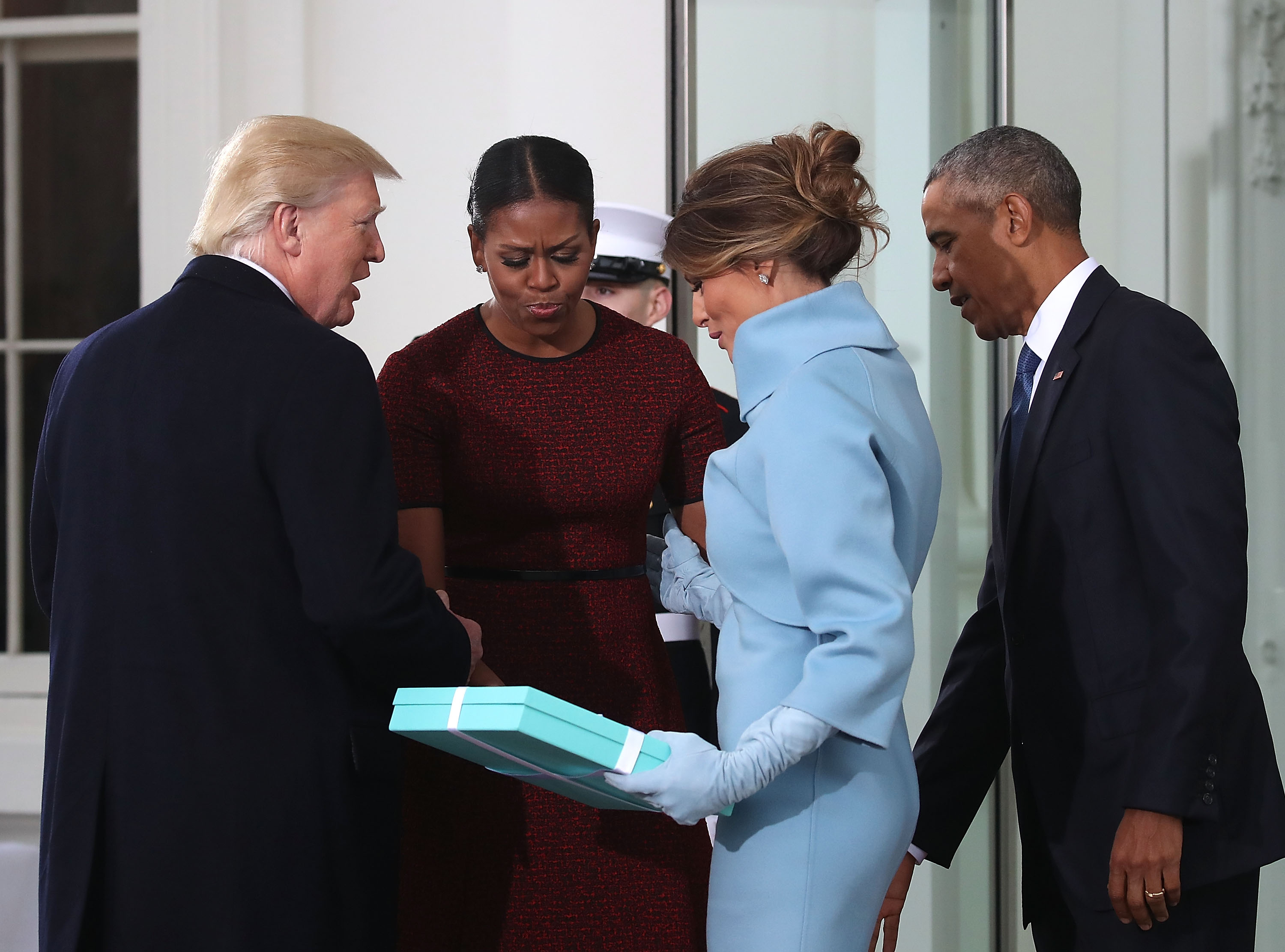 WASHINGTON, DC - JANUARY 20: President-elect Donald Trump (L),and his wife Melania Trump (2ndR), are greeted by President Barack Obama and his wife first lady Michelle Obama, upon arriving at the White House on January 20, 2017 in Washington, DC. Later in the morning President-elect Trump will be sworn in as the nation's 45th president during an inaugural ceremony at the U.S. Capitol. (Photo by Mark Wilson/Getty Images)