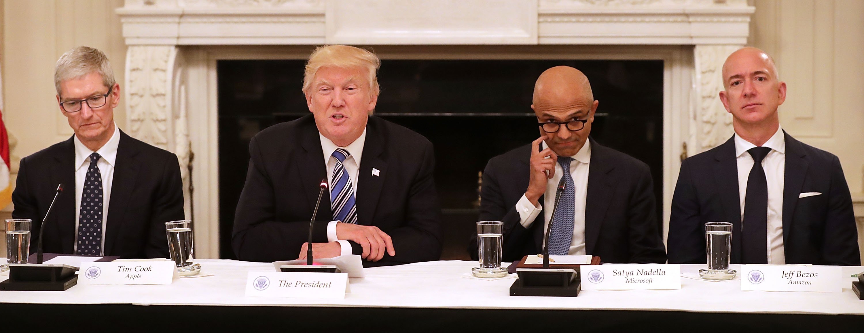 WASHINGTON, DC - JUNE 19: U.S. President Donald Trump (2nd L) welcomes members of his American Technology Council, including (L-R) Apple CEO Tim Cook, Microsoft CEO Satya Nadella and Amazon CEO Jeff Bezos in the State Dining Room of the White House June 19, 2017 in Washington, DC. According to the White House, the council's goal is "to explore how to transform and modernize government information technology." (Photo by Chip Somodevilla/Getty Images)