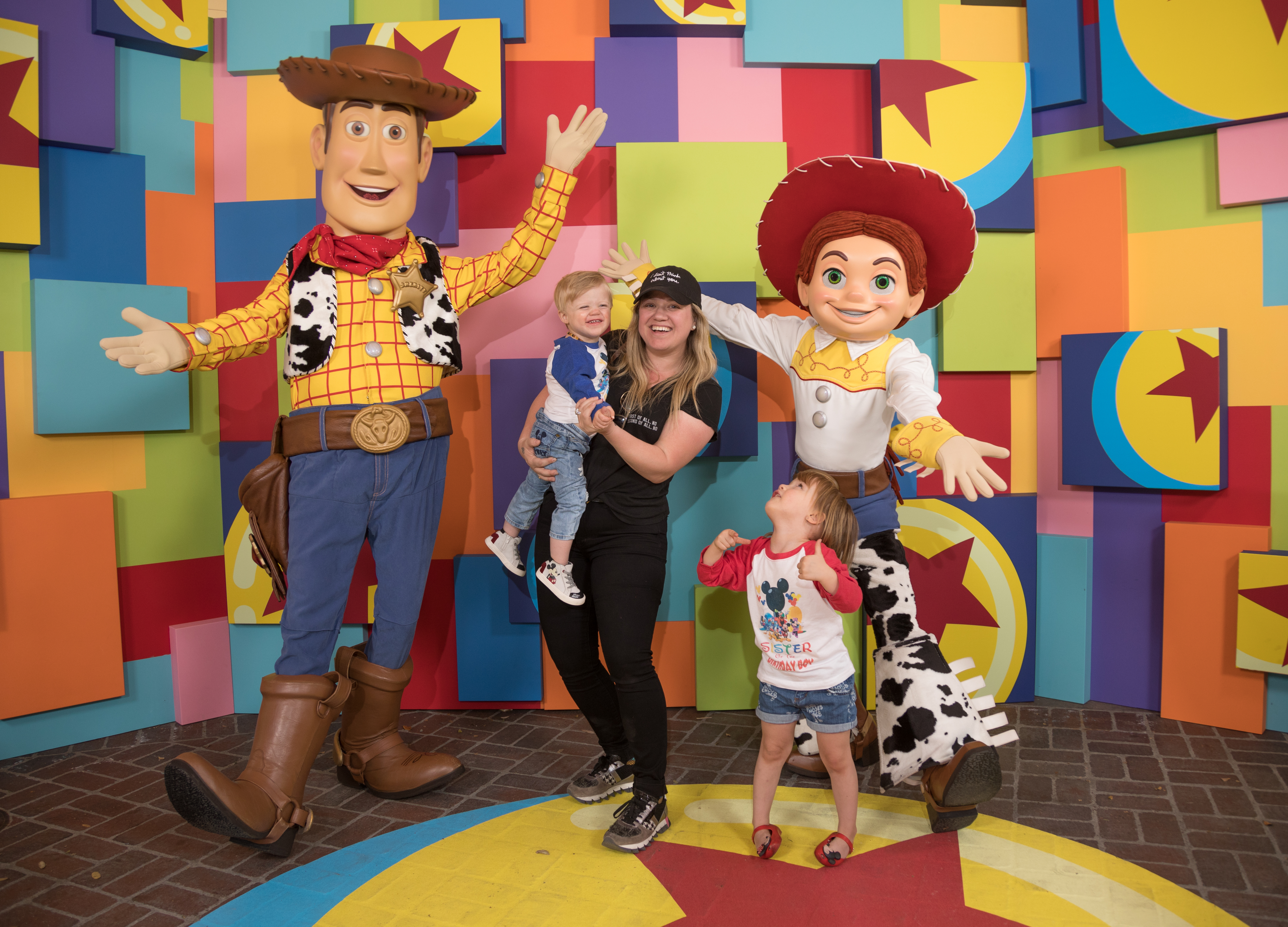 ANAHEIM, CA - APRIL 12: In this handout photo provided by Disneyland Resort, singer Kelly Clarkson and her children, Remington Alexander and River Rose, visit with Pixar pals Woody and Jessie at the launch of Pixar Fest at the Disneyland Resort in Anaheim, Calif., on Thursday. The first-ever Pixar Fest, the biggest Pixar celebration ever to come to Disney Parks, continues through Sept. 3, 2018. (Photo by Christian Thompson/Disneyland Resort via Getty Images)