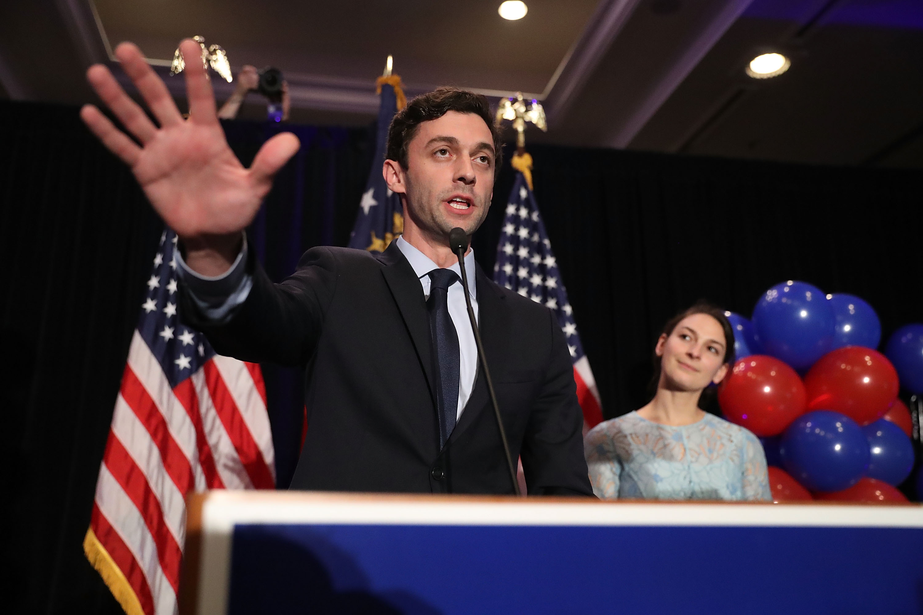 Democratic candidate Jon Ossoff delivers a concession speech as his fiancee, Alisha Kramer, listens during his election night party being held at the Westin Atlanta Perimeter North Hotel after returns show him losing the race for Georgia's 6th Congressional District on June 20, 2017 in Atlanta, Georgia. (Joe Raedle/Getty Images)