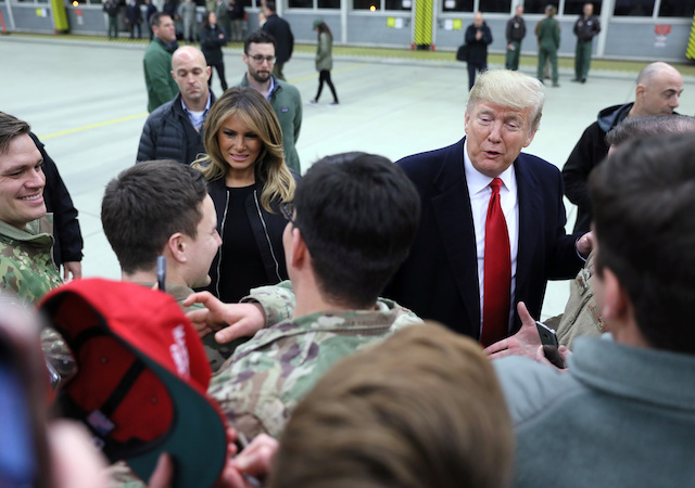 U.S. President Donald Trump and first lady Melania Trump greet U.S. troops at Ramstein Air Force Base, Germany, December 27, 2018. REUTERS/Jonathan Ernst