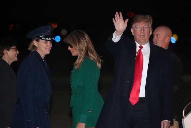 U.S. President Donald Trump and first lady Melania Trump arrive aboard Air Force One at the end of an unannounced visit with U.S. troops in Iraq, at Joint Base Andrews, Maryland, U.S. December 27, 2018. REUTERS/Jonathan Ernst
