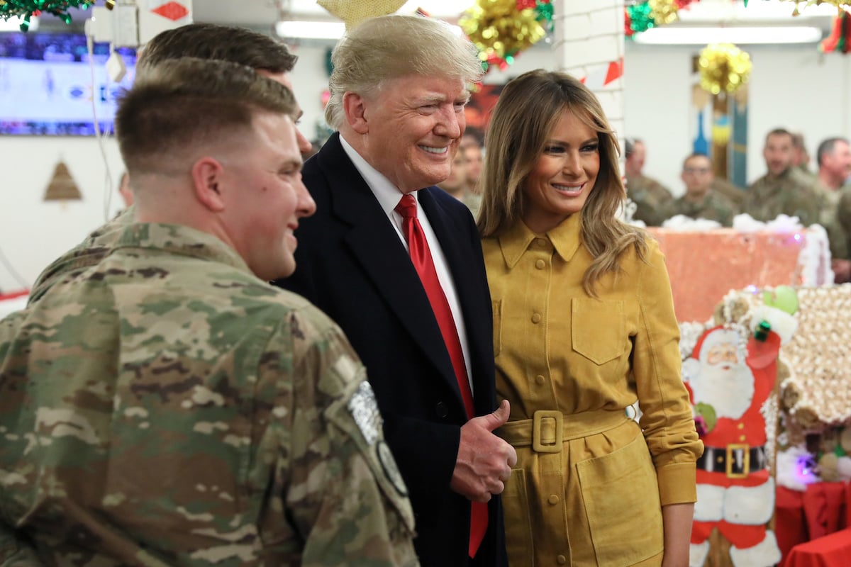 U.S. President Donald Trump and First Lady Melania Trump greet military personnel at the dining facility during an unannounced visit to Al Asad Air Base, Iraq December 26, 2018. REUTERS/Jonathan Ernst