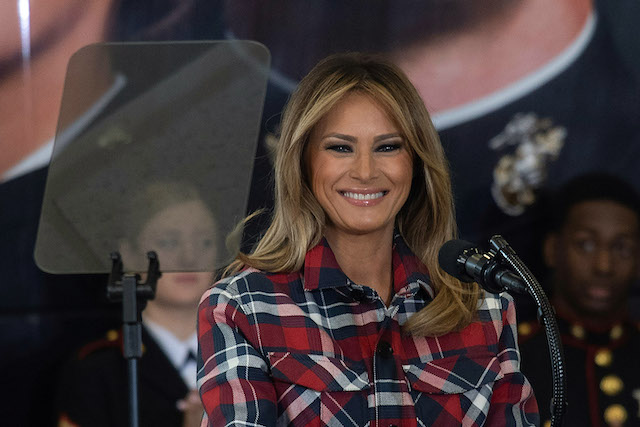 US First Lady Melania Trump speaks at a Toys for Tots event at Joint Base nacostia-Bolling in Washington, DC, on December 11, 2018. - Toys for Tots is a program run by the United States Marine Corps Reserve which distributes toys to children whose parents cannot afford to buy them gifts for Christmas. (Photo credit: NICHOLAS KAMM/AFP/Getty Images)