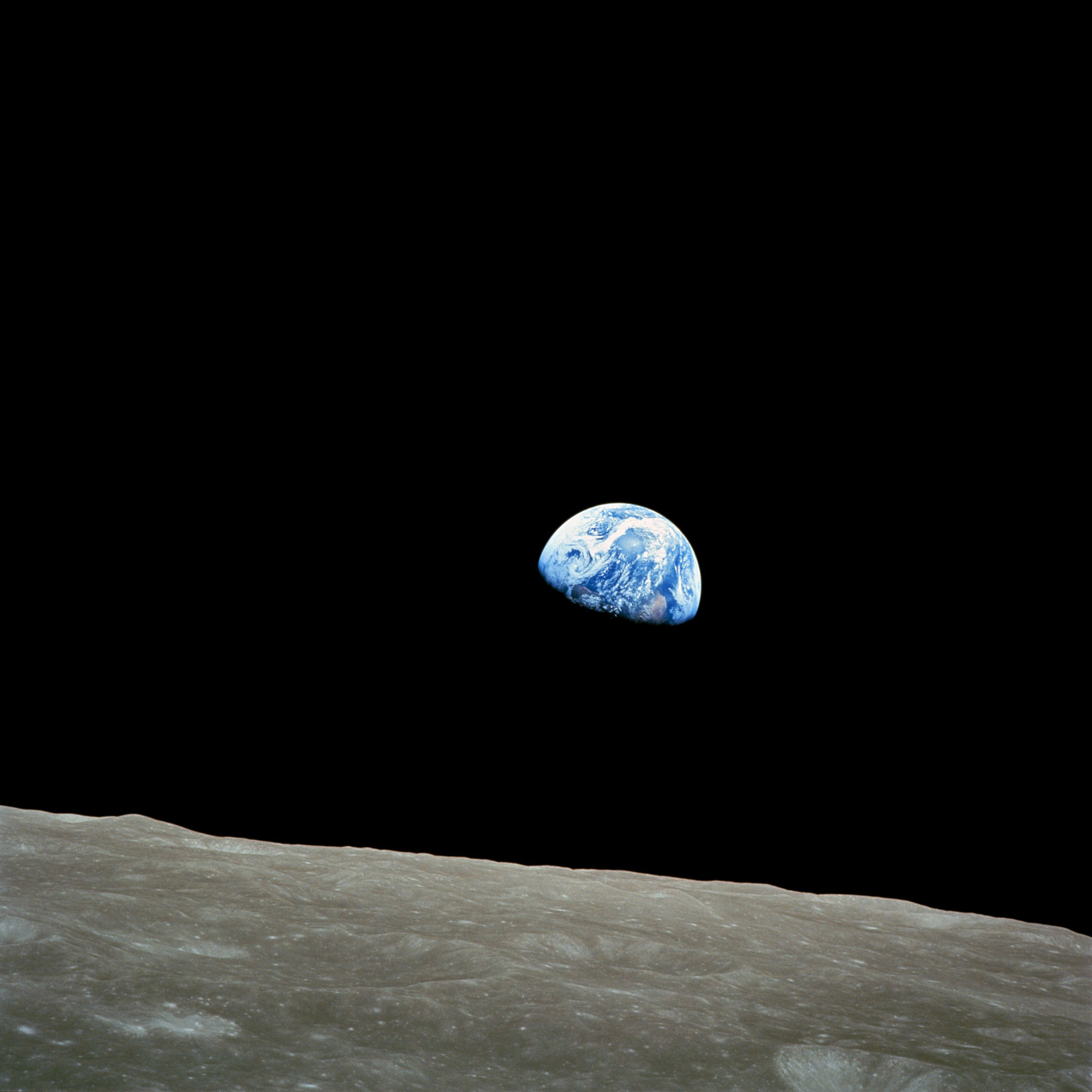 The distant blue Earth is seen above the Moon's limb, in this handout picture taken by the Apollo 8 crew forty-five years ago, on December 24, 1968, courtesy of NASA. Frank Borman, James Lovell, and William Anders were launched atop a Saturn V rocket on December 21, 1968 circled the Moon ten times in their command module, and returned to Earth on December 27. The Apollo 8 mission's impressive list of firsts includes: the first humans to journey to the Earth's Moon, the first to fly using the Saturn V rocket, and the first to photograph the Earth from deep space. REUTERS/NASA/Handout via Reuters 