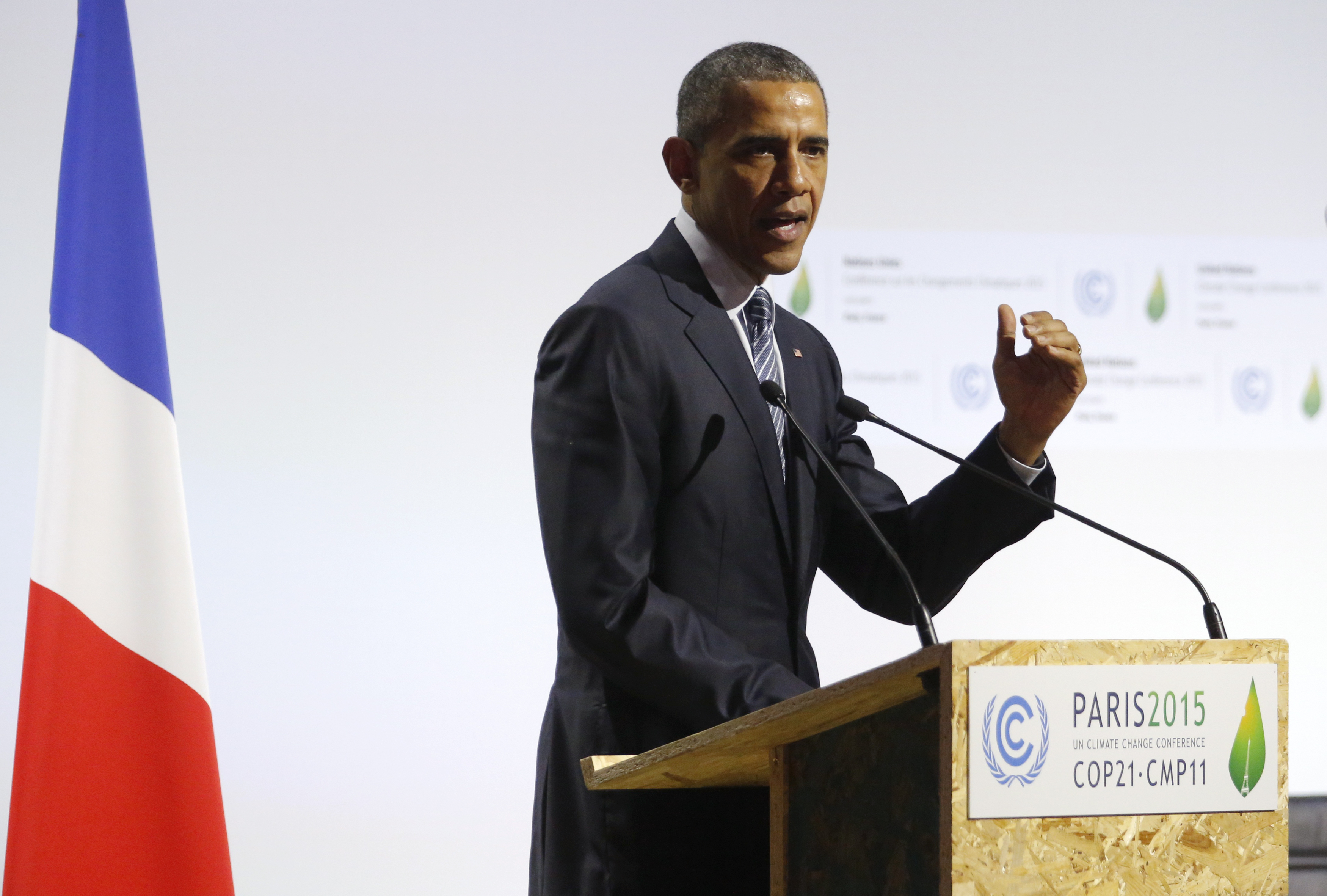 US President Barack Obama delivers a speech on the opening day of the World Climate Change Conference 2015 in Le Bourget