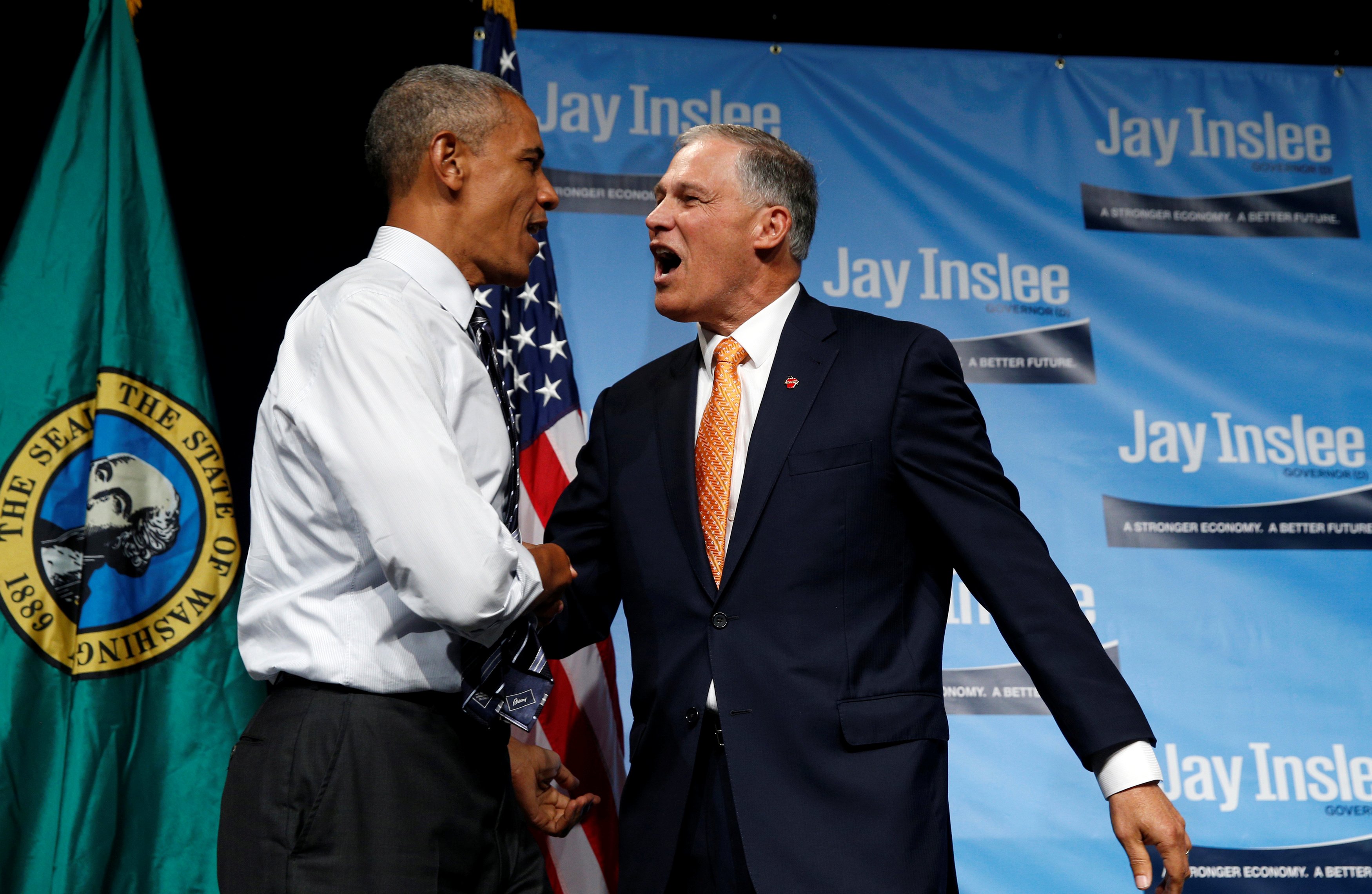 U.S. President Barack Obama takes the stage to speak at a fundraiser for Washington Governor Jay Inslee in Seattle
