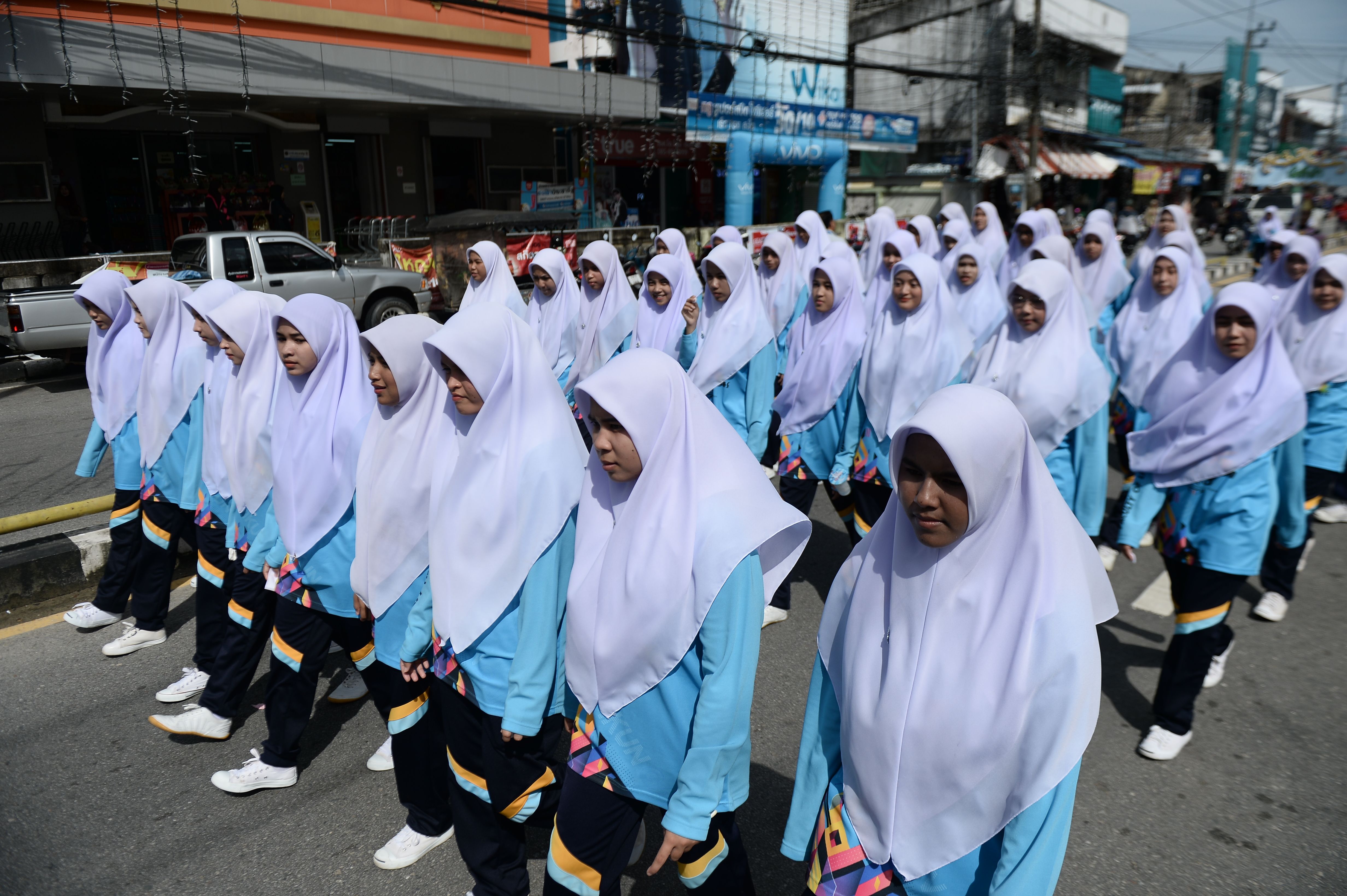 Muslim students from Princess of Naradhiwas University participate in the university's annual parade in Thailand's predominantly Muslim province of Narathiwat on Nvoebmer 12, 2018. (MADAREE TOHLALA/AFP/Getty Images)