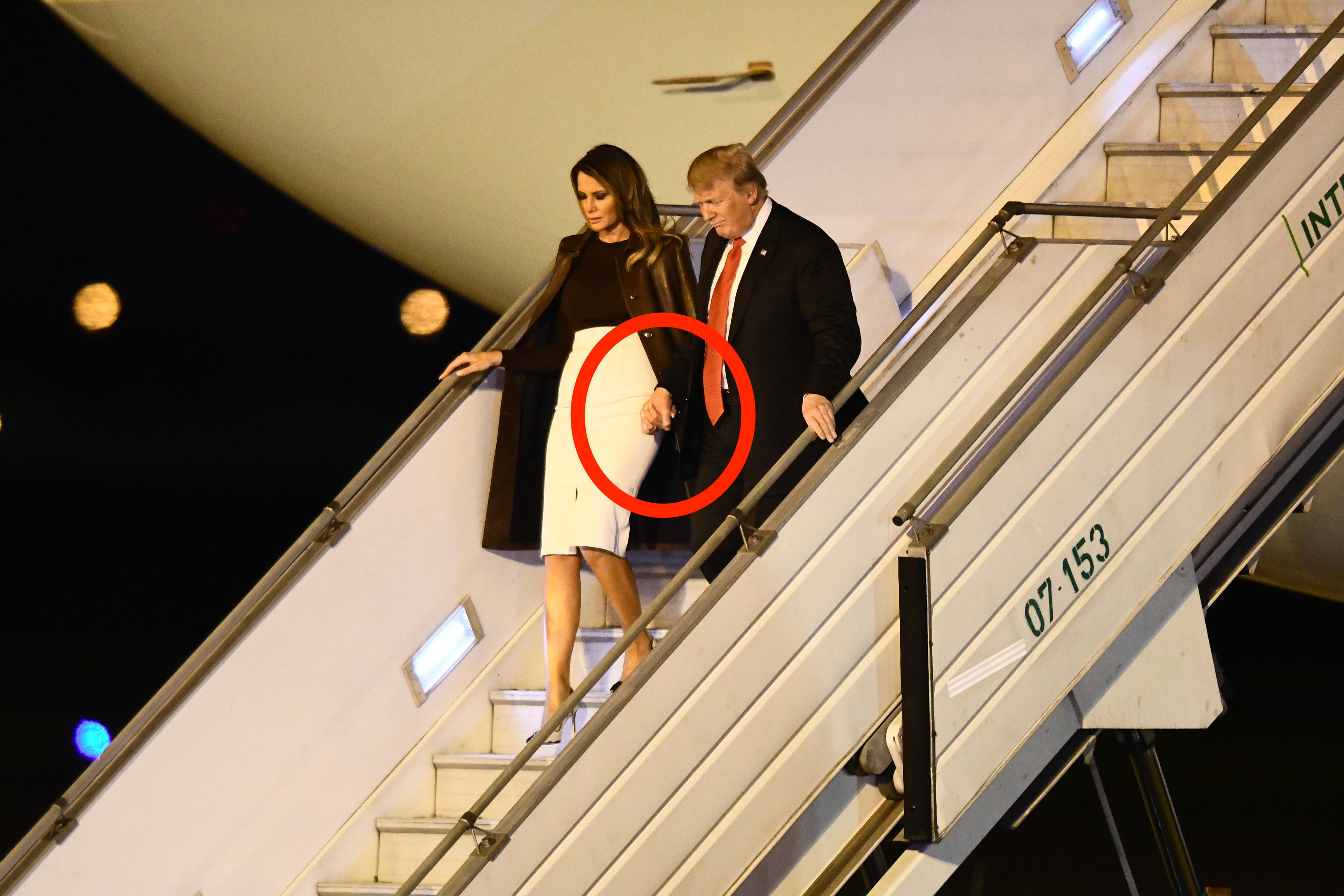 BUENOS AIRES, ARGENTINA - NOVEMBER 29: U.S. President Donald Trump and his wife Melania Trump descend from the Air Force One on their arrival to Buenos Aires for G20 Leaders' Summit 2018 at Ministro Pistarini International Airport on November 29, 2018 in Ezeiza, Buenos Aires, Argentina. Leaders of the G20 group of nations are meeting for the November 30th - December 1st summit. Amilcar Orfali/Getty Images