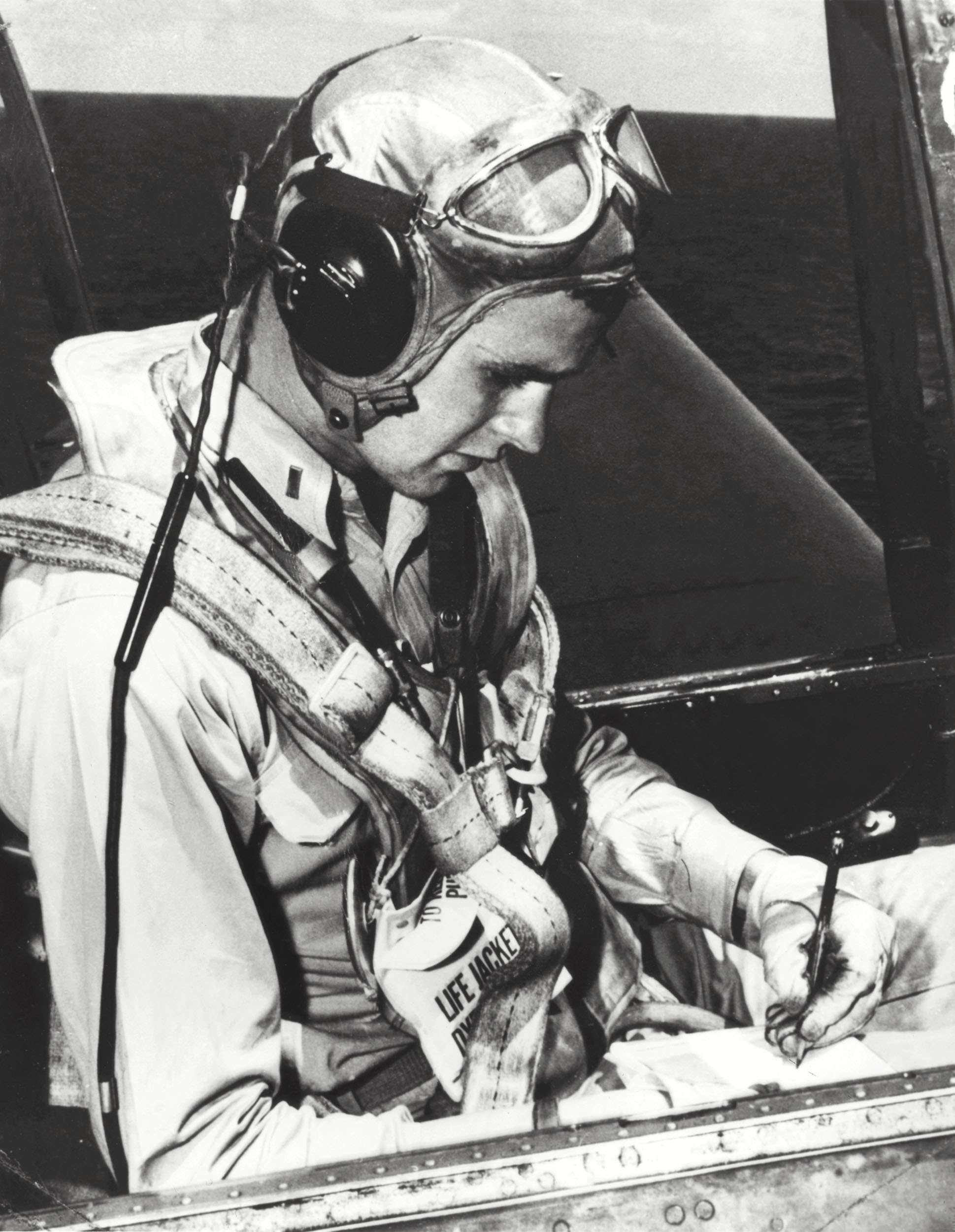 George Herbert Walker Bush is pictured in the cockpit of his TBM Avenger during the World War II. Born 12 June 1924 in Milton, Massachussetts, George Bush Yale graduated with a degree in Economics in 1948, made a fortune drilling oil before entering politics in 1964. US Congressman from Texas (1966-1970), ambassador to the United nations (1971-1974), Special Envoy to China (1974-1975), Republican National Chairman (1975-1976), Central Intelligence Agency (CIA) director (1976-1977), vice president of the US (1981-1959) George Bush is eventually elected president of the US 08 November 1988 against Democratic nominee Michael Dukakis. AFP PHOTO/WHITE HOUSE (Photo credit should read /AFP/Getty Images)