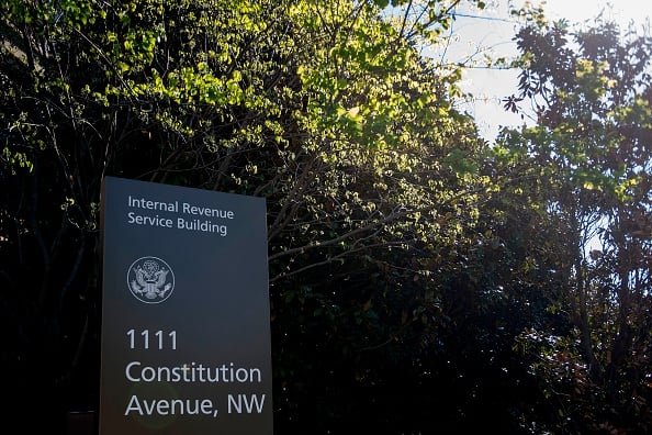 A sign for the Internal Revenue Service building is viewed in Washington, DC, on April 18, 2018.