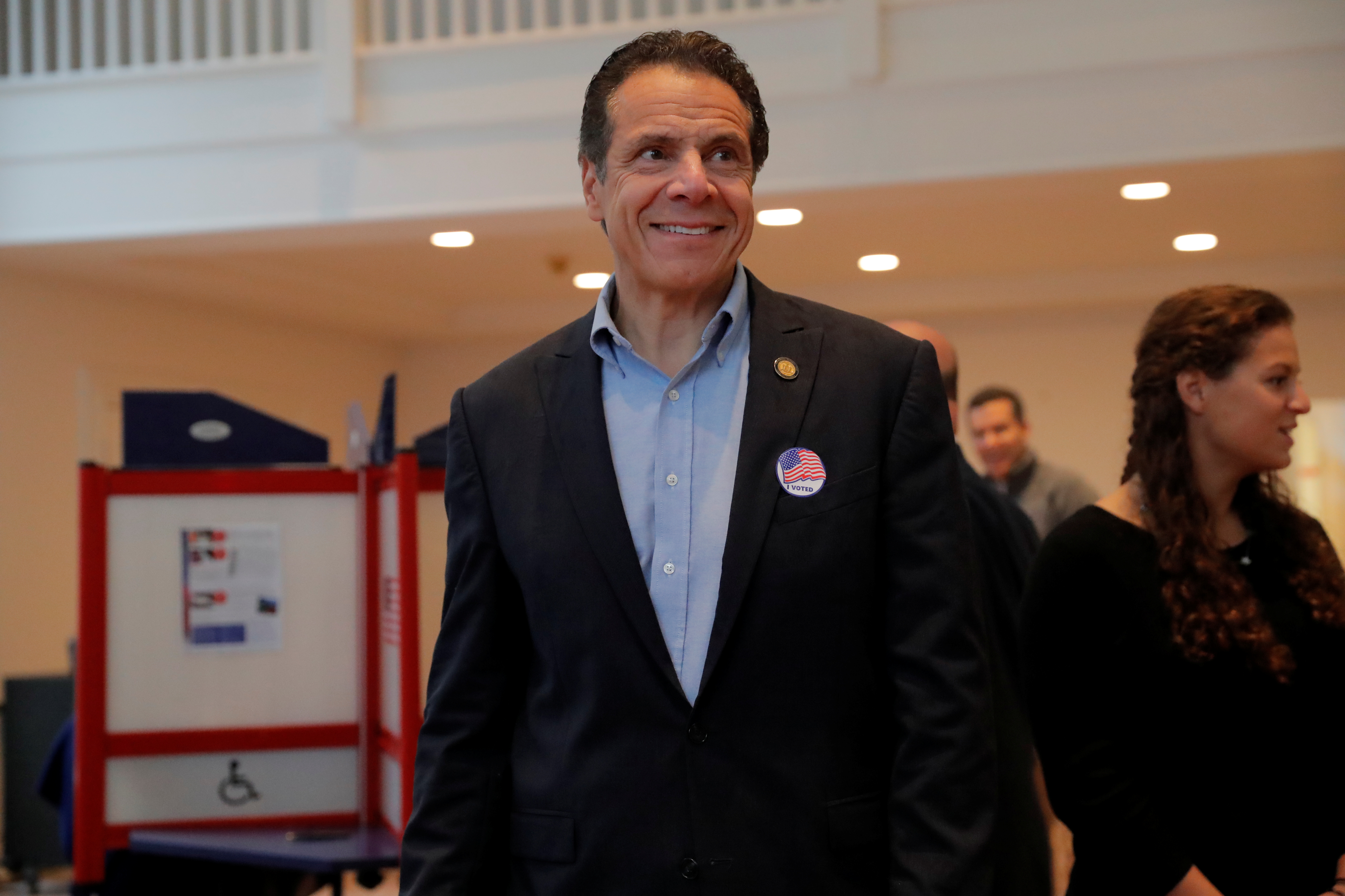 Democratic New York Governor Andrew Cuomo smiles wearing an I voted sticker after casting his vote at the Presbyterian Church in Mt. Kisco, New York, U.S., November 6, 2018. REUTERS/Caitlin Ochs