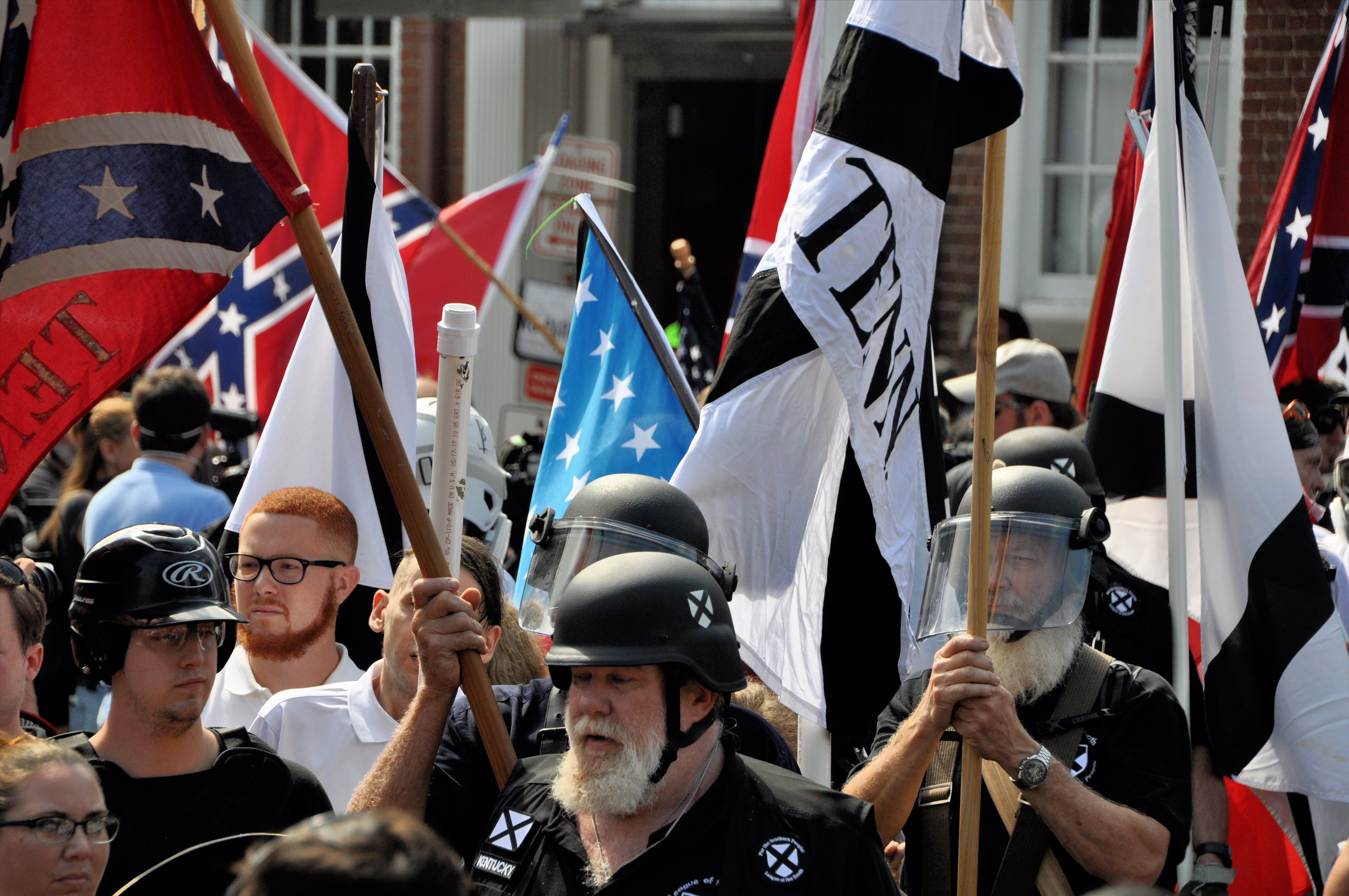  CHARLOTTESVILLE, VA - August 12, 2017: White nationalists and counter protesters clash in during a rally that turned violent resulting in the death of one and multiple injuries. SHUTTERSTOCK/ Kim Kelley-Wagner