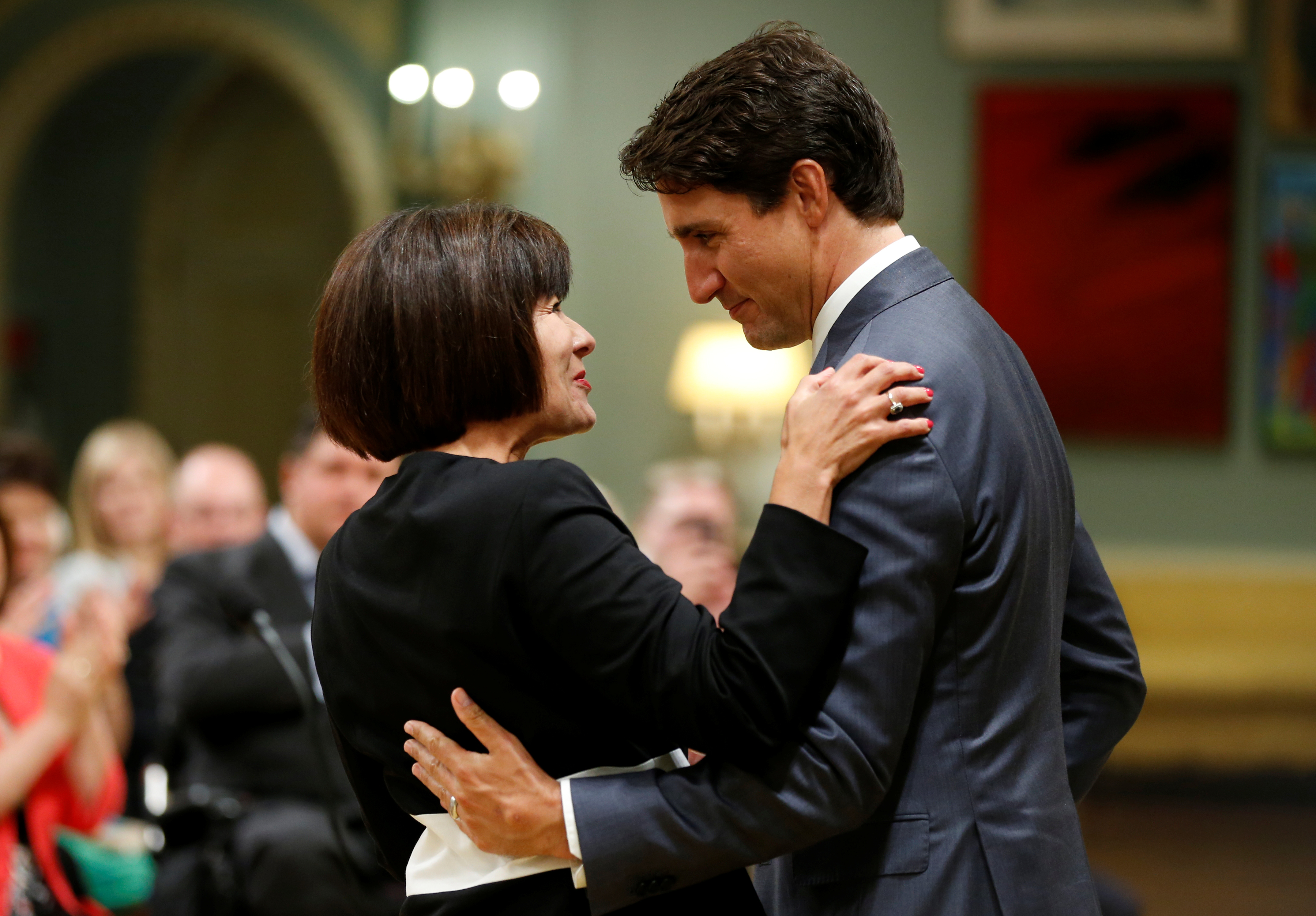 Canada's Prime Minister Justin Trudeau (R) congratulates Ginette Petitpas Taylor after she was sworn-in as Canada's Minister of Health during a cabinet shuffle at Rideau Hall in Ottawa, Ontario, Canada, August 28, 2017. REUTERS/Chris Wattie 