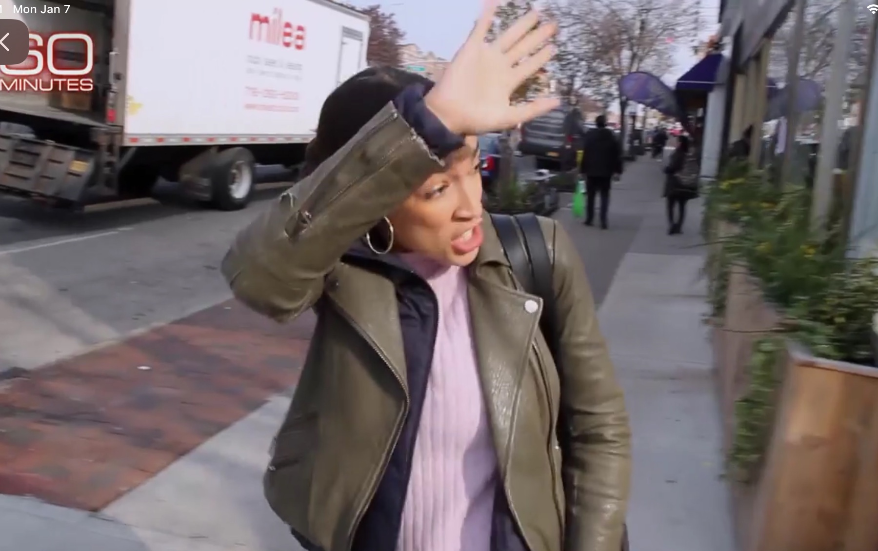 Rep. Alexandria Ocasio-Cortez waves to supporters as she leaves for Capitol Hill. CBS News screenshot, Jan. 6, 2019.