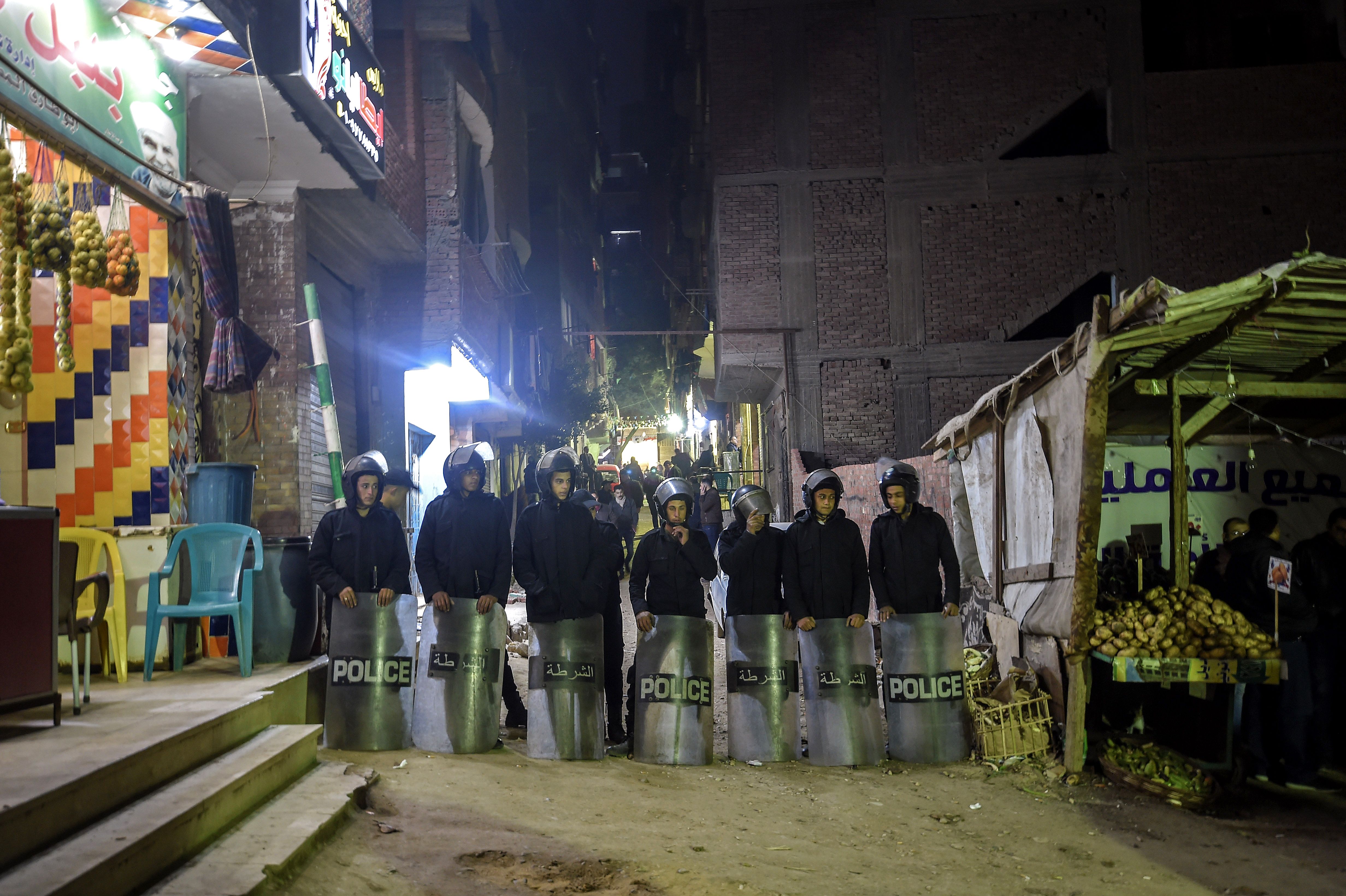Security forces guard a street leading to the church were an expolosion ocurred leaving one casualty, in Cairo on January 5, 2019. - A policeman was killed while trying to dismantle an explosive device outside a Coptic church in Egypt on Saturday, January 5, 2019, a security source said. Two other officers were also wounded in the explosion as security personnel attempted to defuse the device in Nasr City on the edge of Cairo, the source added. (MOHAMED EL-SHAHED/AFP/Getty Images)