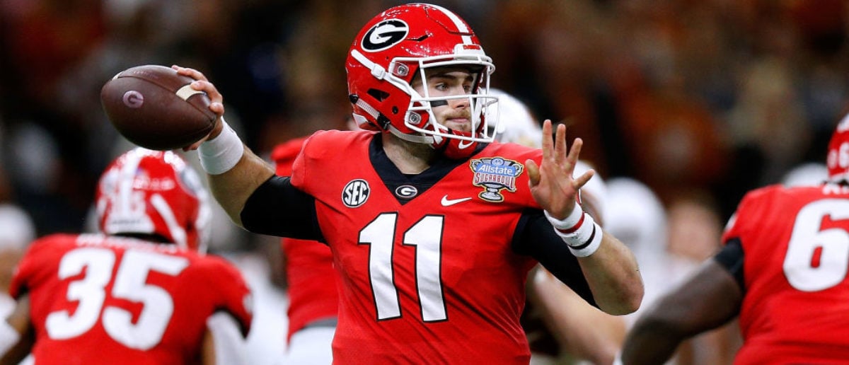 NEW ORLEANS, LOUISIANA - JANUARY 01: Jake Fromm #11 of the Georgia Bulldogs throws the ball during the first half of the Allstate Sugar Bowl against the Texas Longhorns at the Mercedes-Benz Superdome on January 01, 2019 in New Orleans, Louisiana. (Photo by Jonathan Bachman/Getty Images)