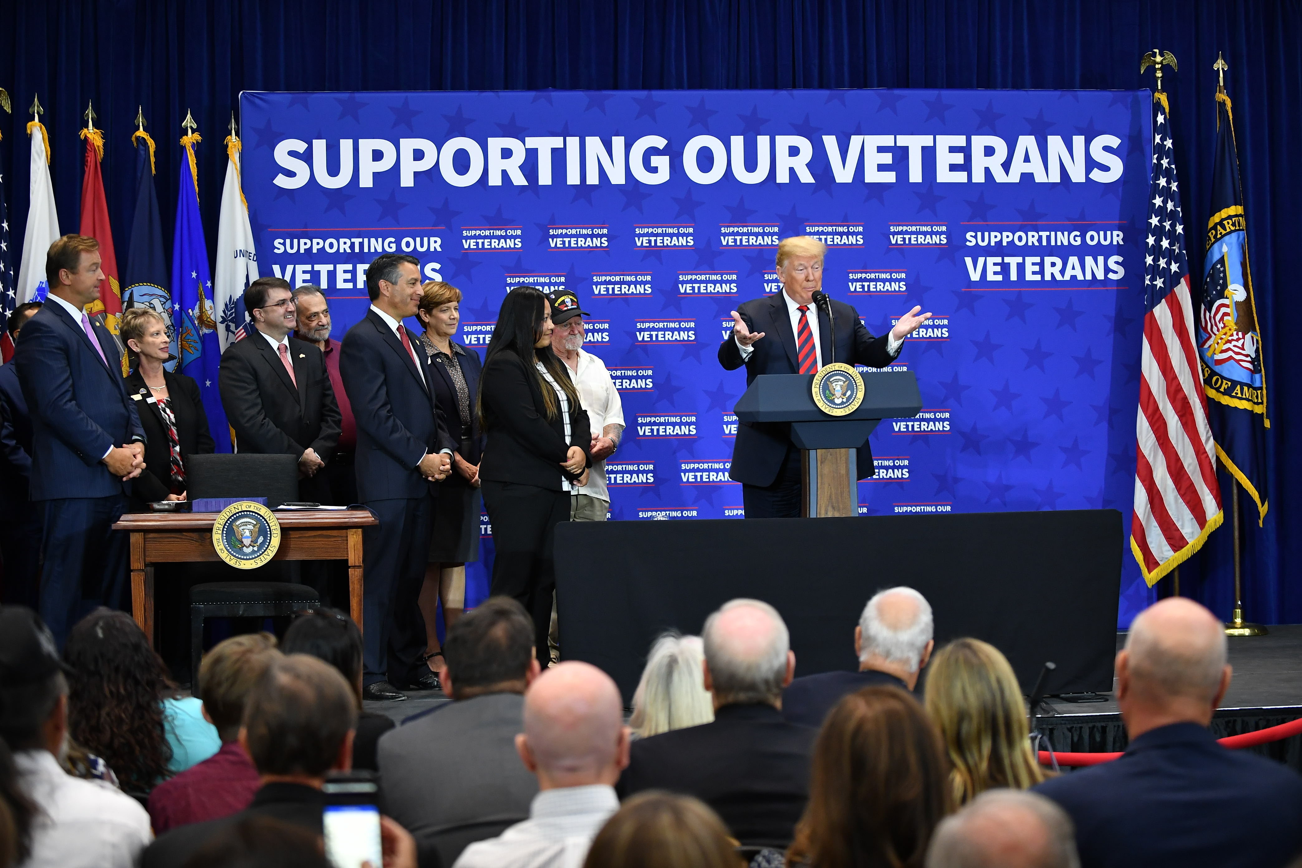 US President Donald Trump speaks at the VA Southern Nevada Healthcare System in Las Vegas on September 21, 2018. - Trump will take part in a signing ceremony for a bill appropriating funds for energy and water, military construction and veterans affairs. (Photo by MANDEL NGAN / AFP) 