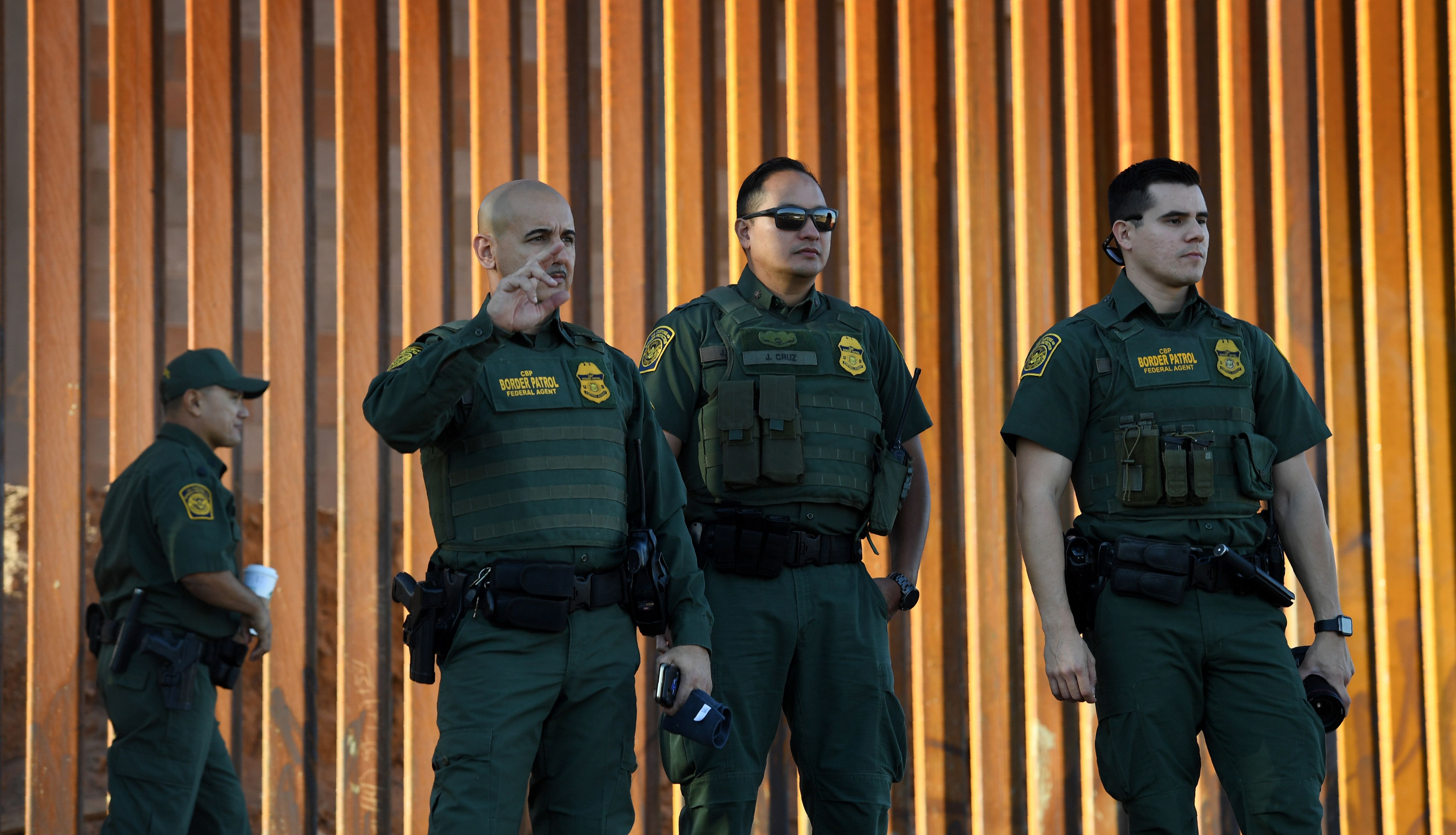 Border Patrol officers patrol before the US Secretary of Homeland Security inaugurates the first completed section of the 30-foot border wall in the El Centro Sector, at the US-Mexico border in Calexico, California on October 26, 2018. (Photo by Mark RALSTON / AFP)