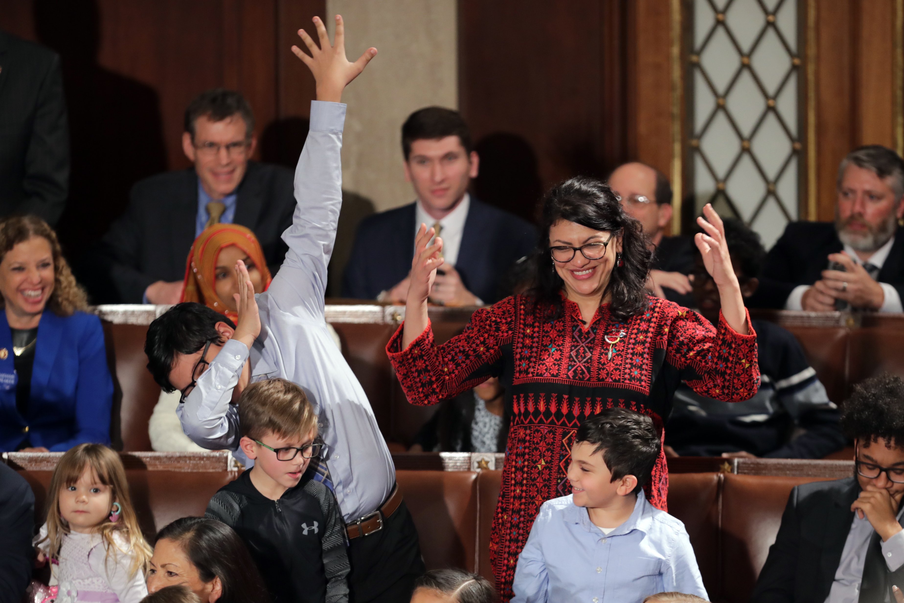 WASHINGTON, DC - JANUARY 3: Rep.-elect Rashida Tlaib (D-MI) votes for Speaker-designate Rep. Nancy Pelosi (D-CA) along with her kids during the first session of the 116th Congress at the U.S. Capitol January 03, 2019 in Washington, DC. Under the cloud of a partial federal government shutdown, Pelosi will reclaim her former title as Speaker of the House and her fellow Democrats will take control of the House of Representatives for the second time in eight years. (Photo by Chip Somodevilla/Getty Images)