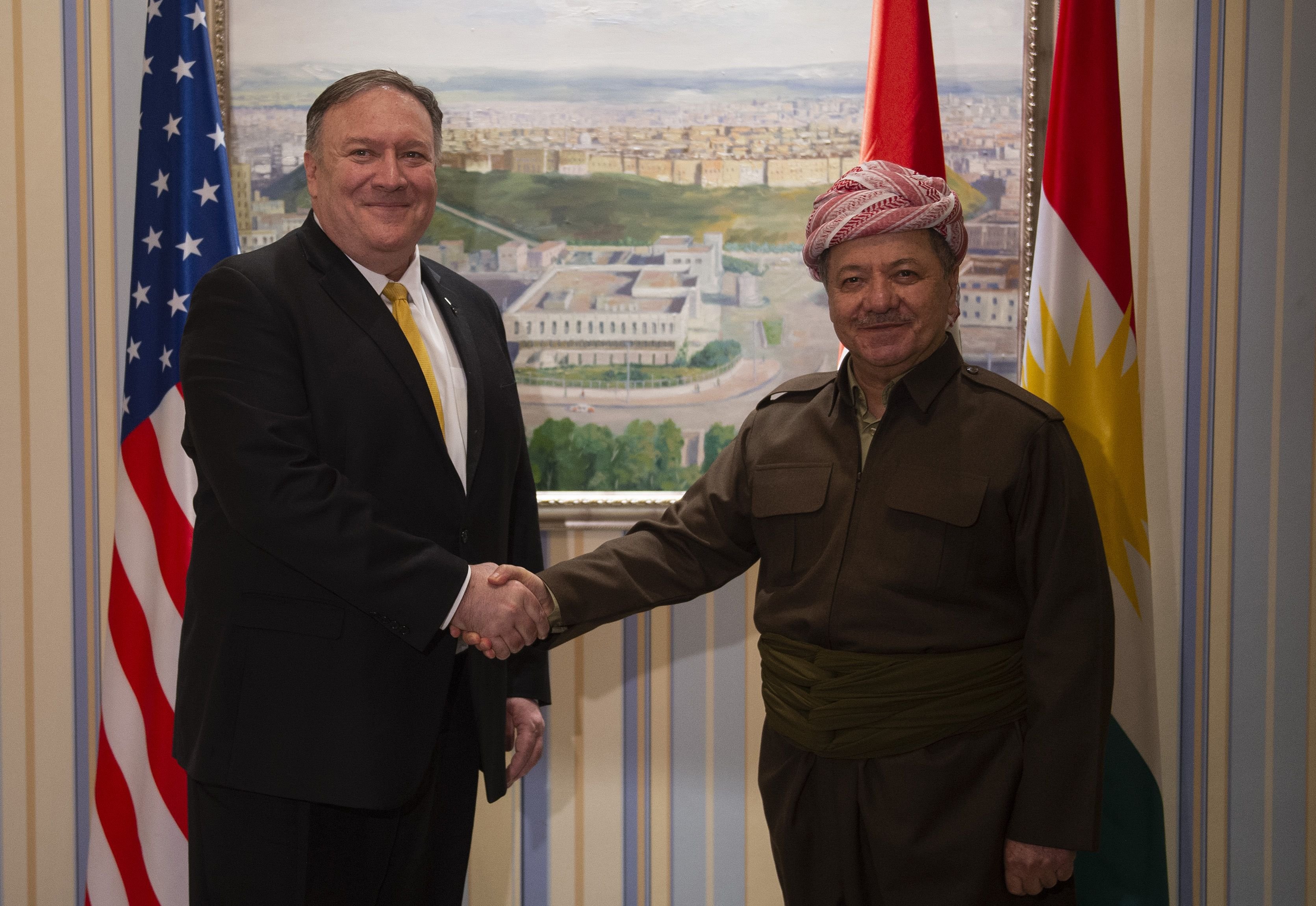 US Secretary of State Mike Pompeo (L) meets with Masoud Barzani leader of the Kurdistan Democratic Party (KDP) in the province's capital Arbil during a Middle East tour, on January 9, 2019. - The eight-day tour comes weeks after the US President announced that the United States would quickly pull its 2,000 soldiers out of Syria, declaring that IS -- also known as ISIS -- had been defeated. (Photo by Andrew CABALLERO-REYNOLDS / AFP) 